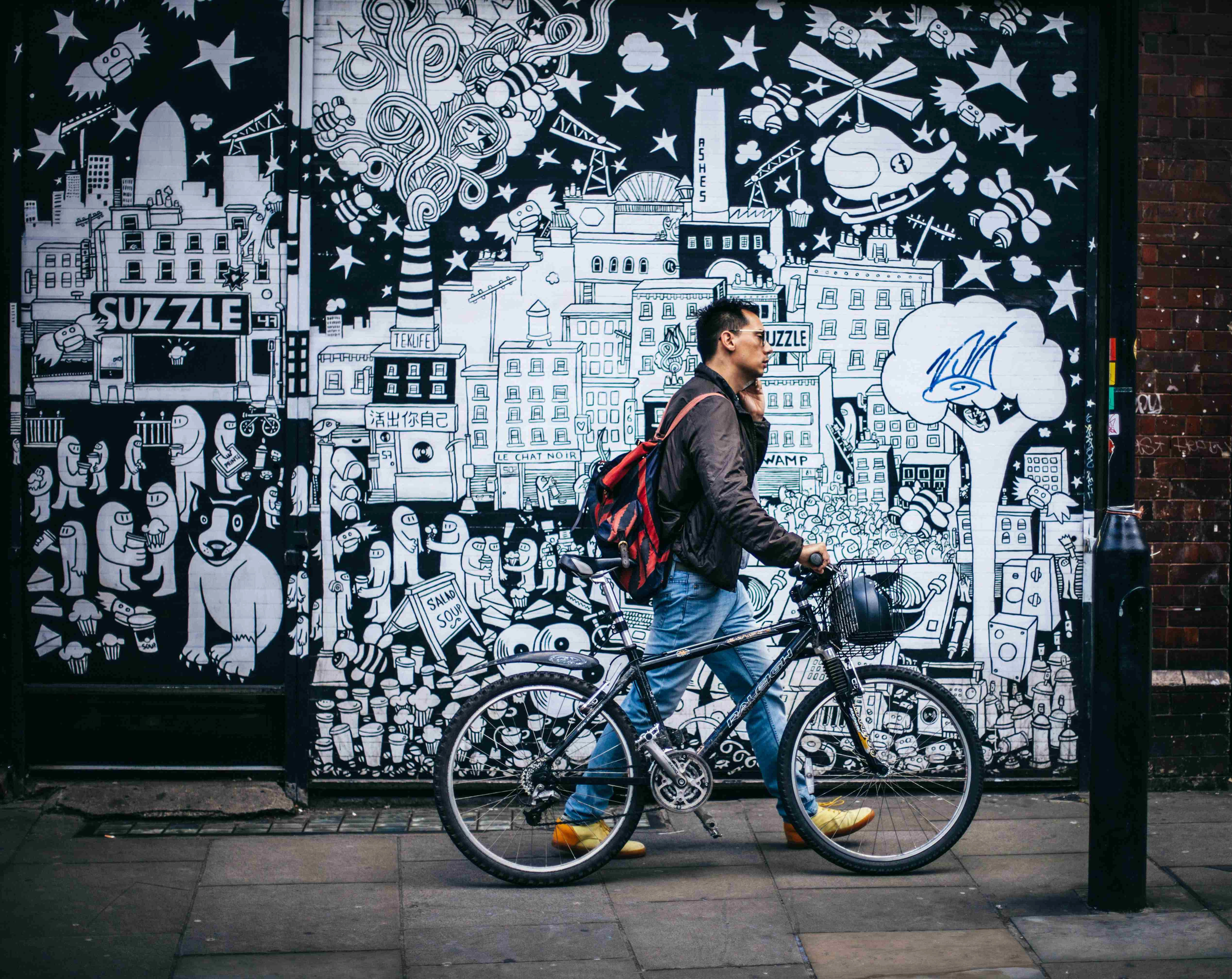 Urban Art Meets Cyclist