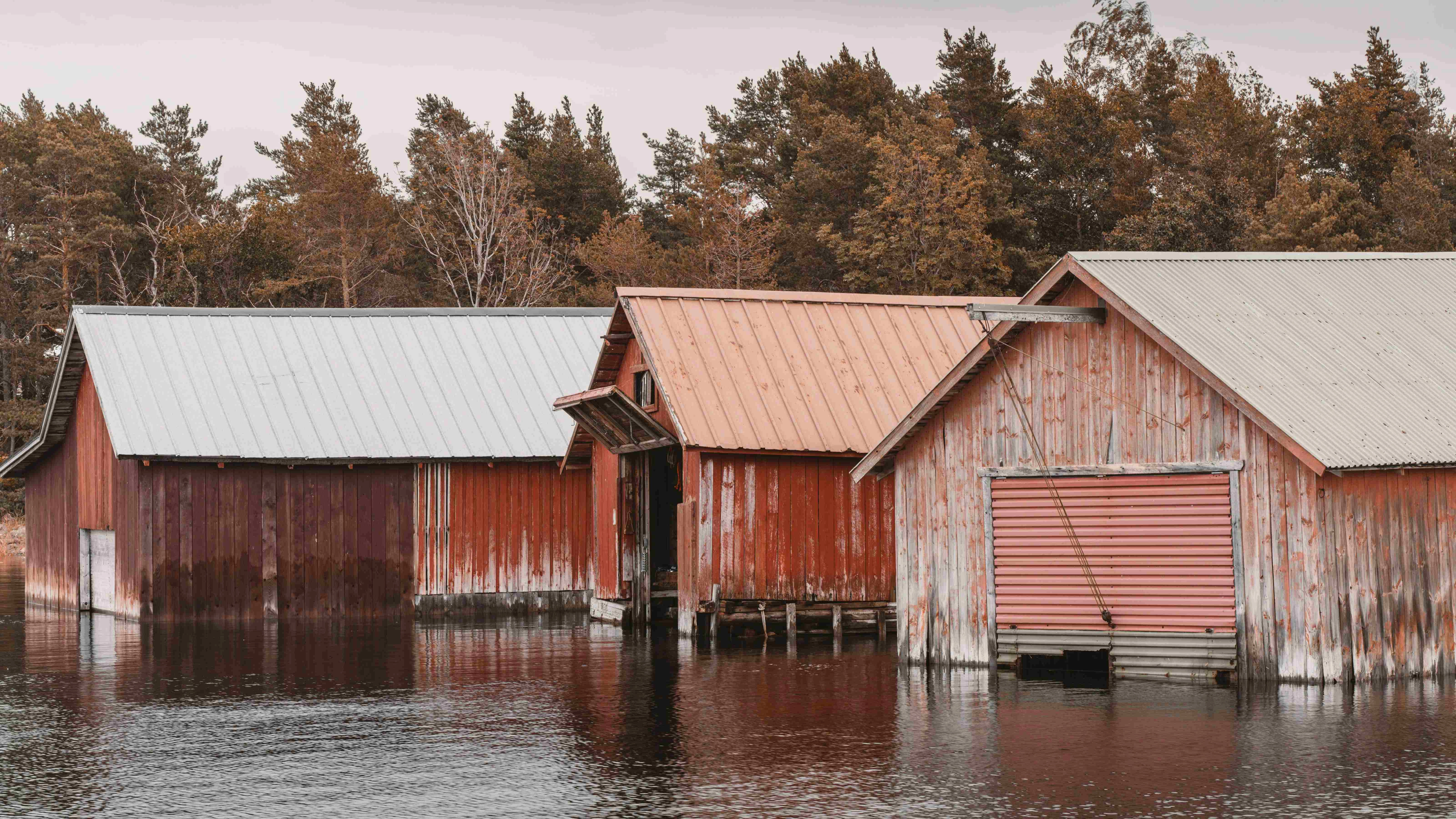 Lakeside Boathouses in Autumn Lakeside Boathouses in Autumn