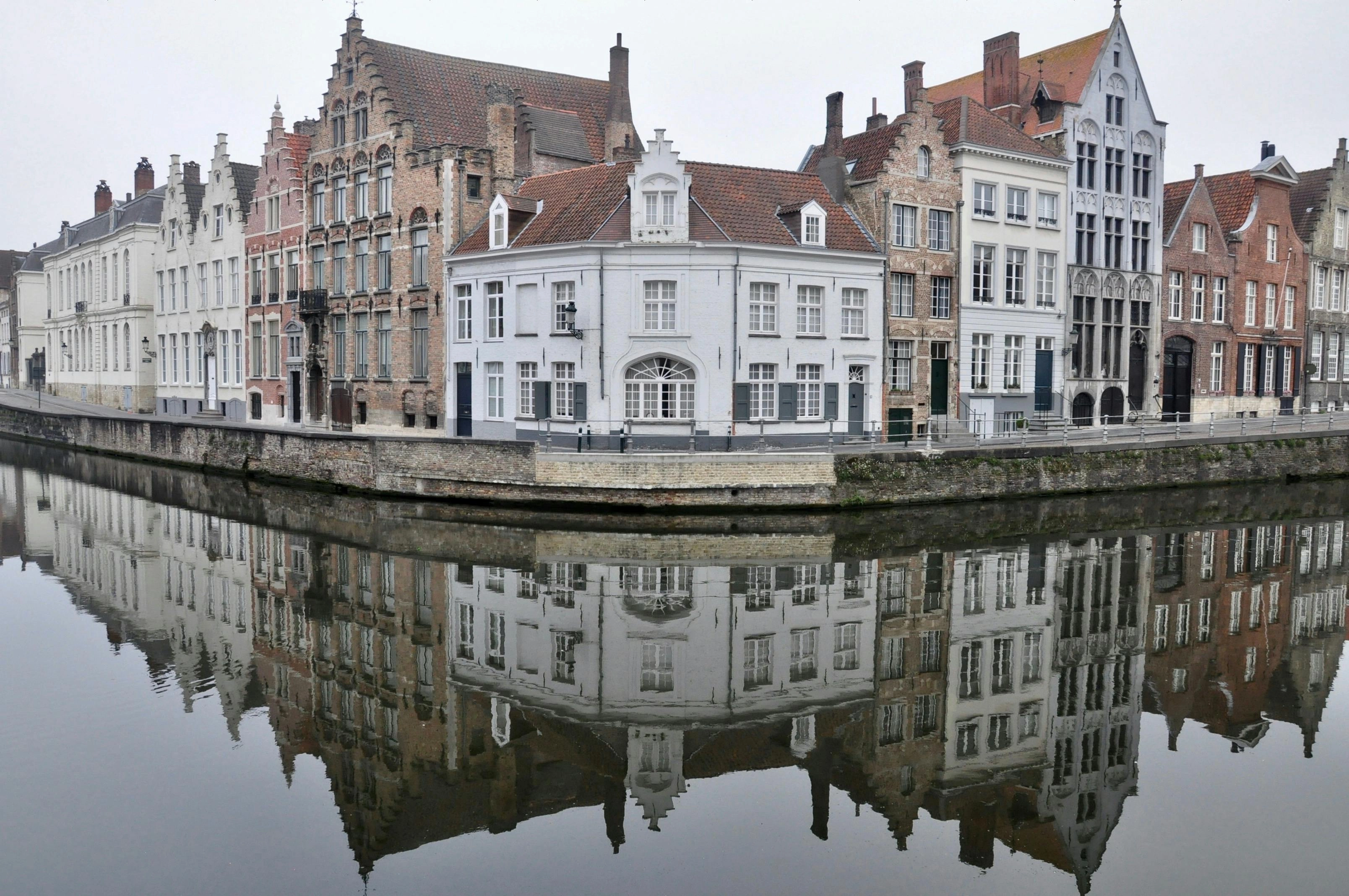 Reflective Bruges Canal Scene Reflective Bruges Canal Scene