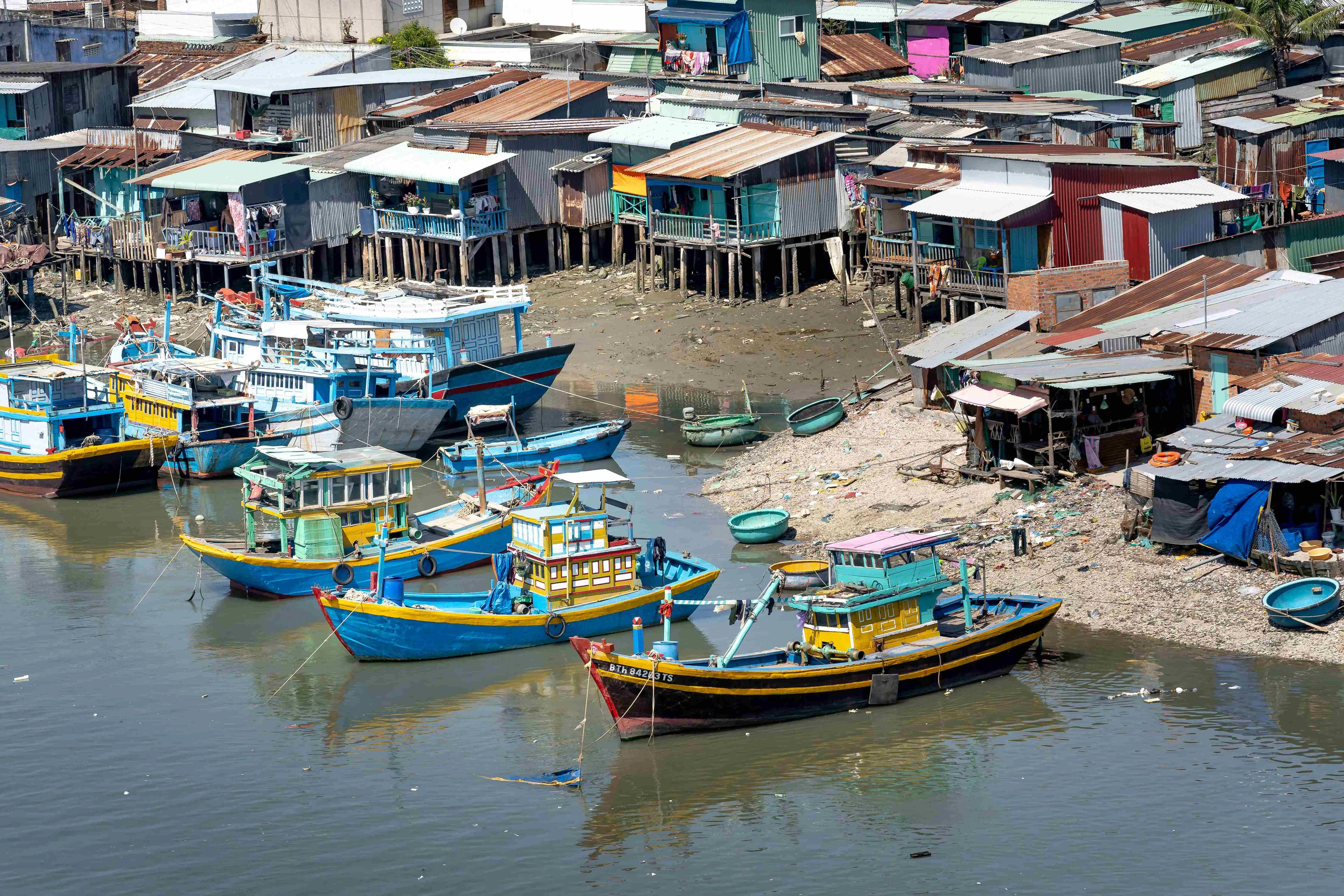 Coastal Slum with Fishing Boats