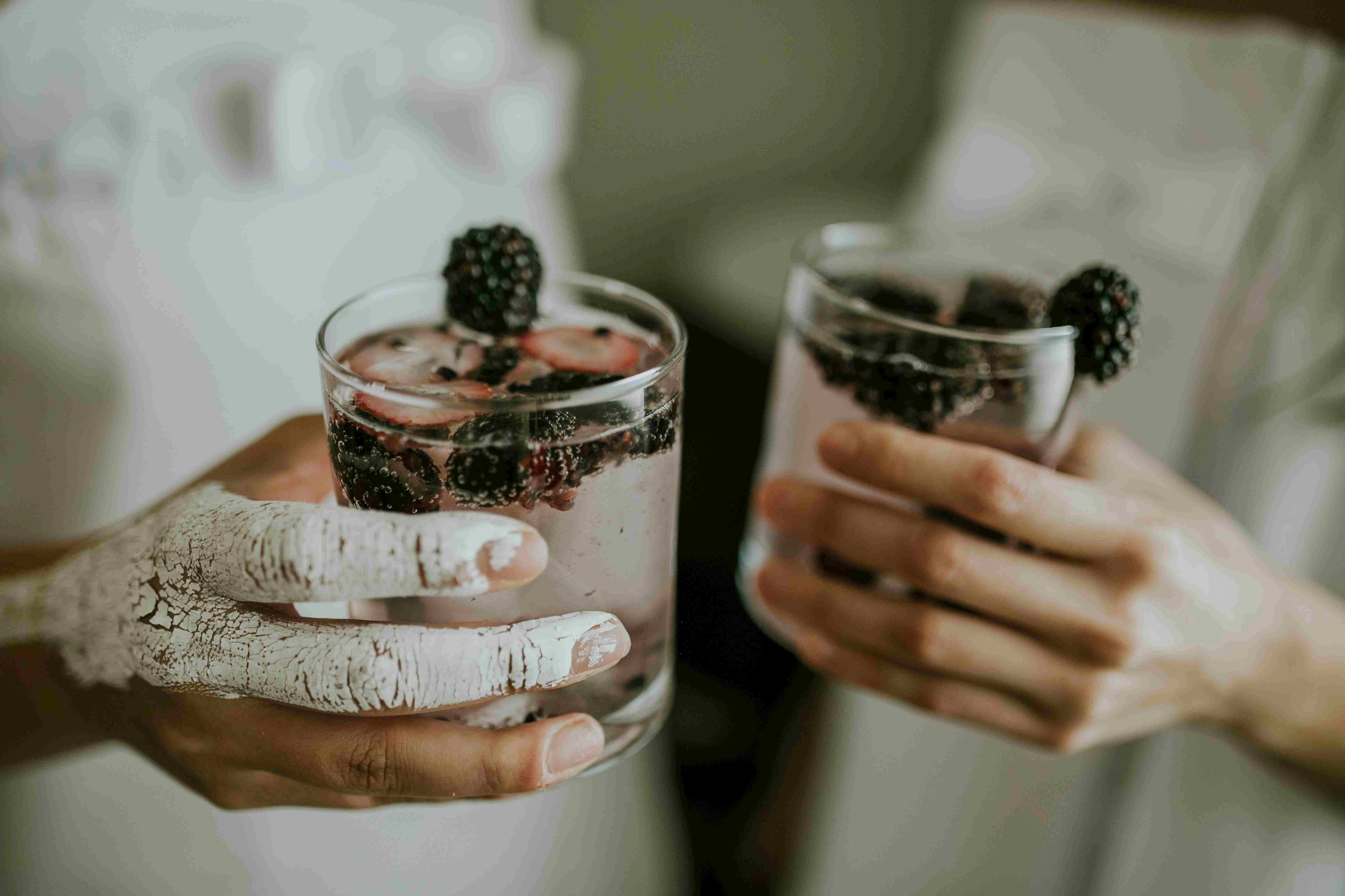 Blackberry Cocktails in Hands