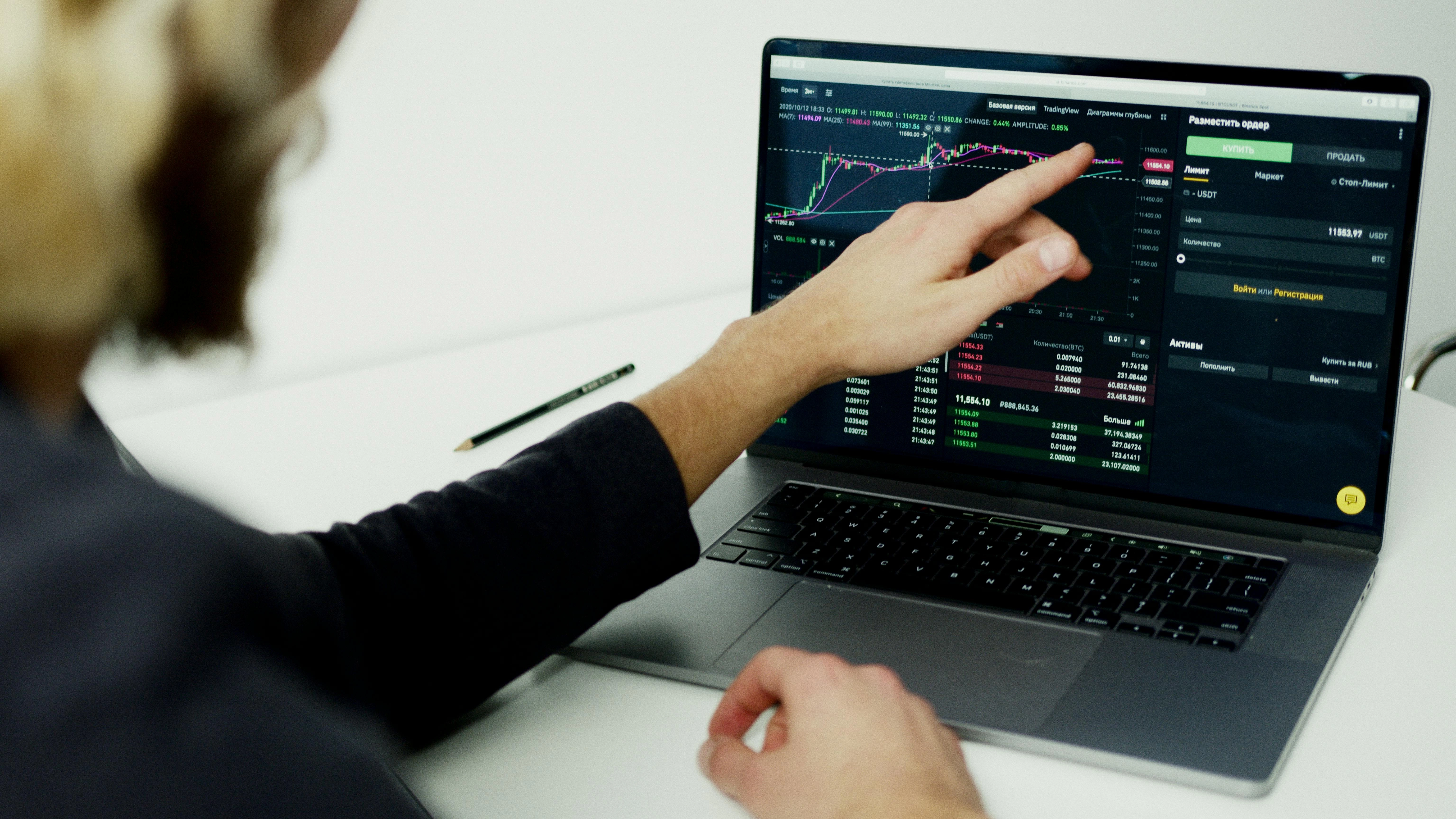Financial trading on laptop Financial trading on laptop