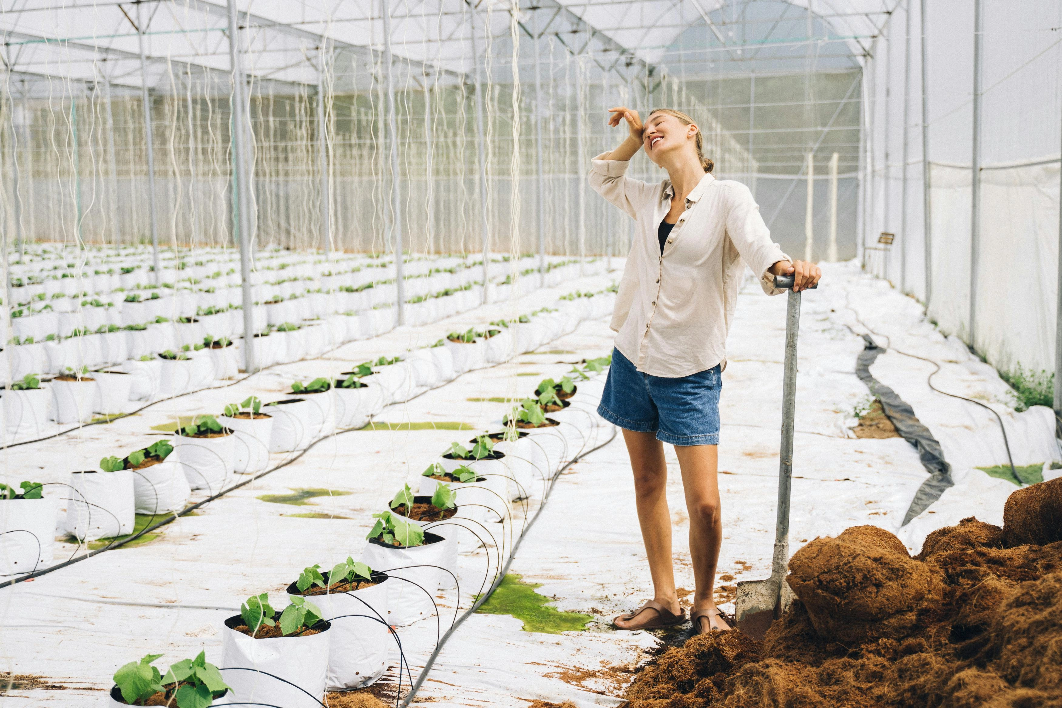 Greenhouse Worker's Joyful Moment