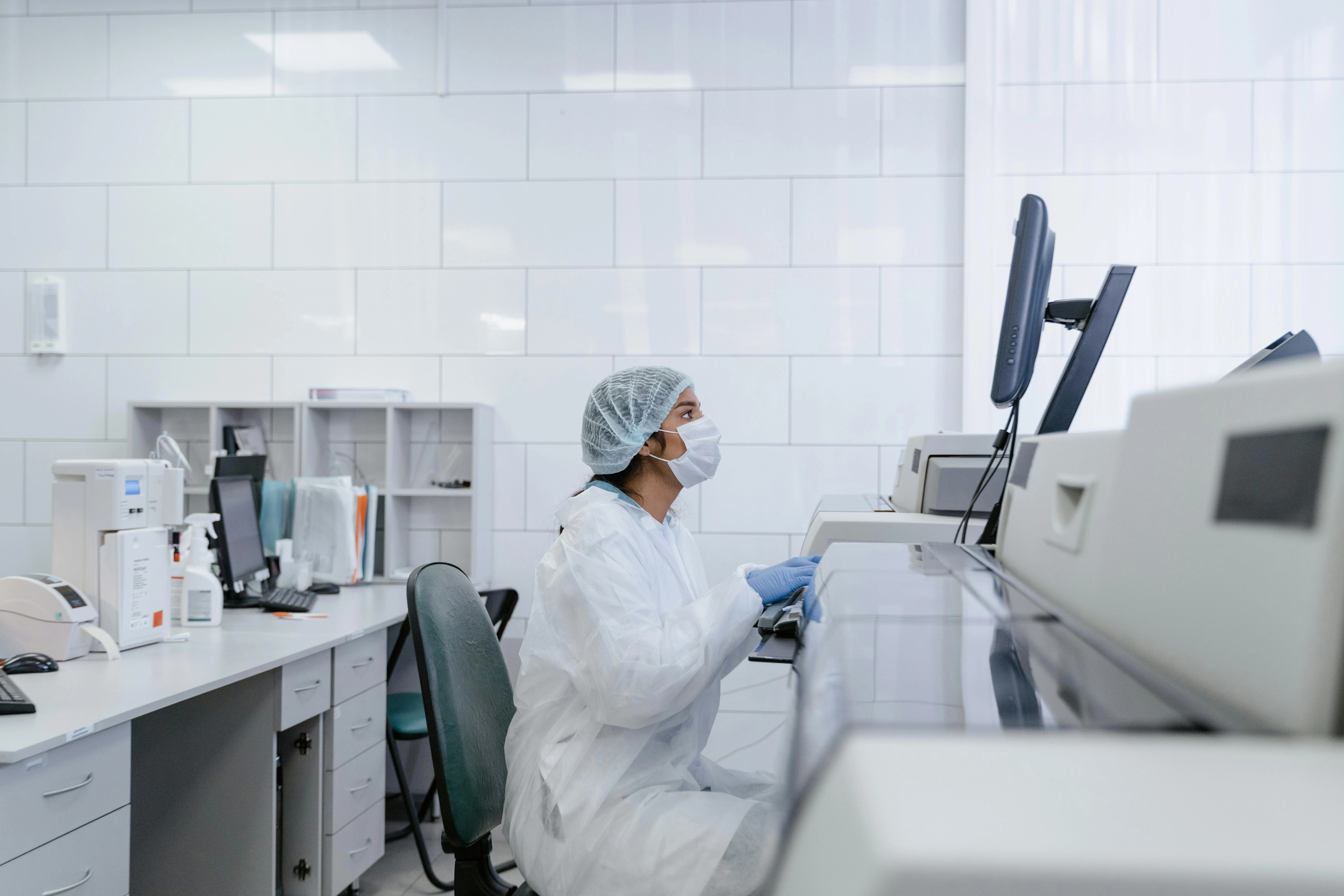 Lab Technician Using Equipment