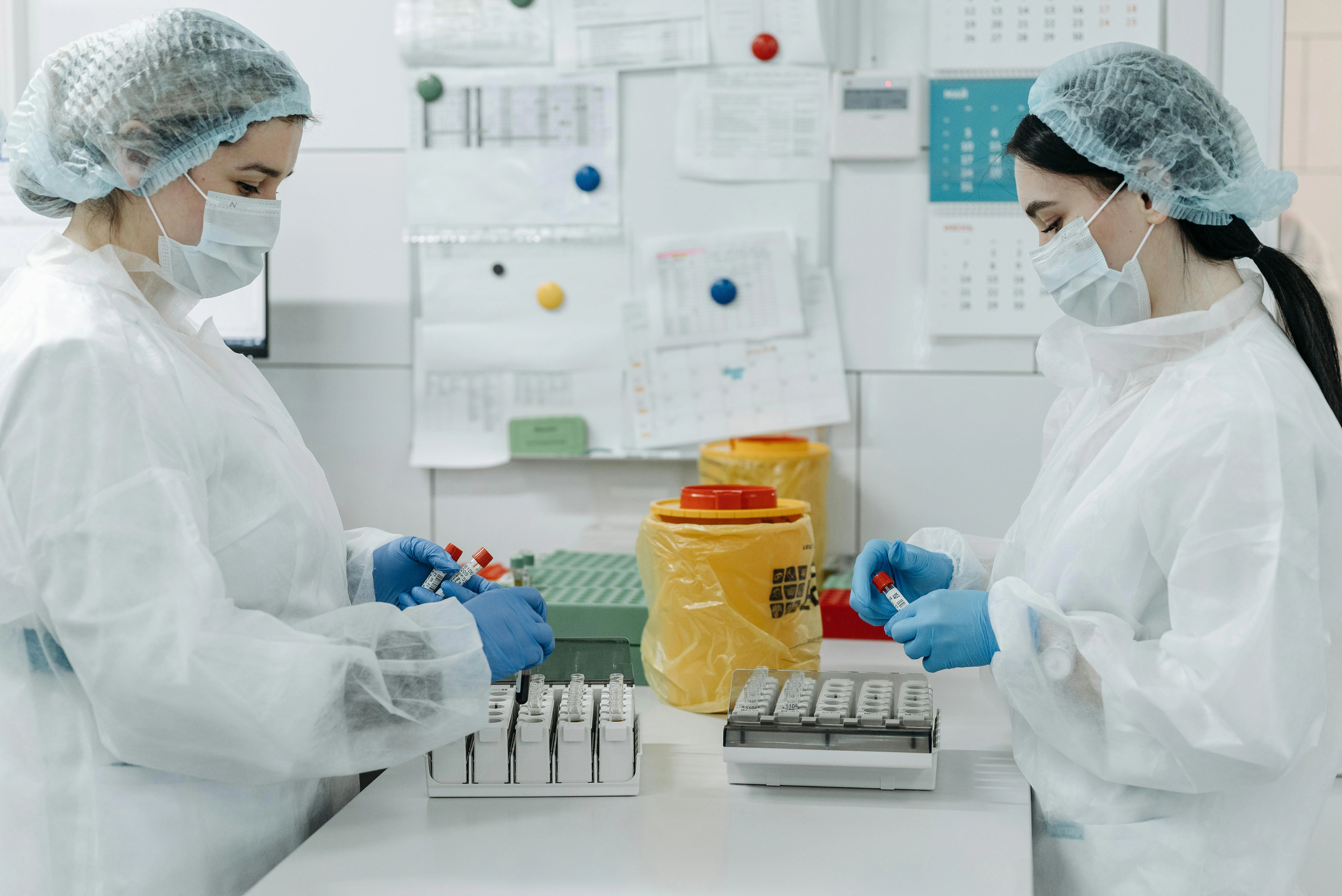 Laboratory Technicians Handling Samples