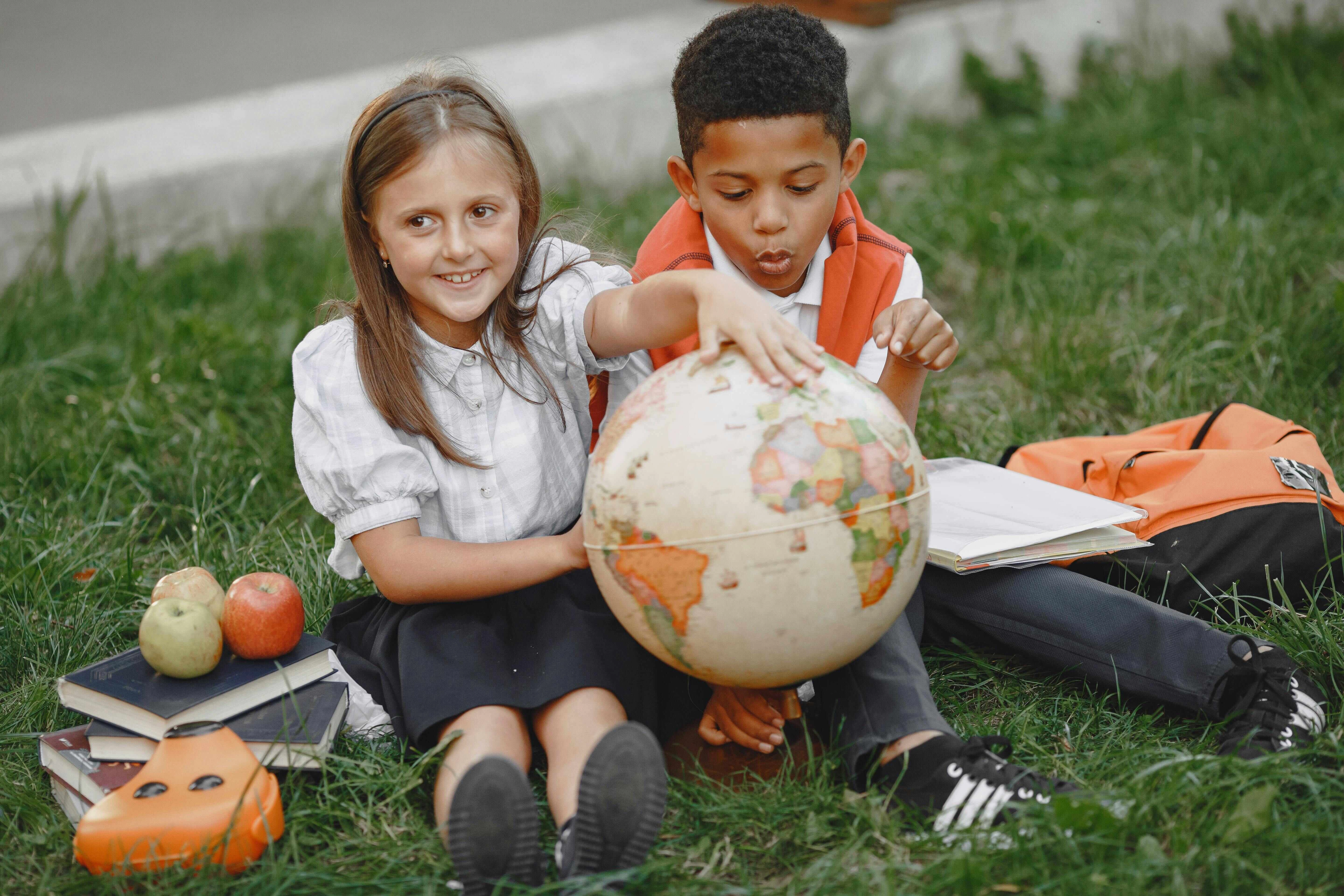 Students Explore World Globe