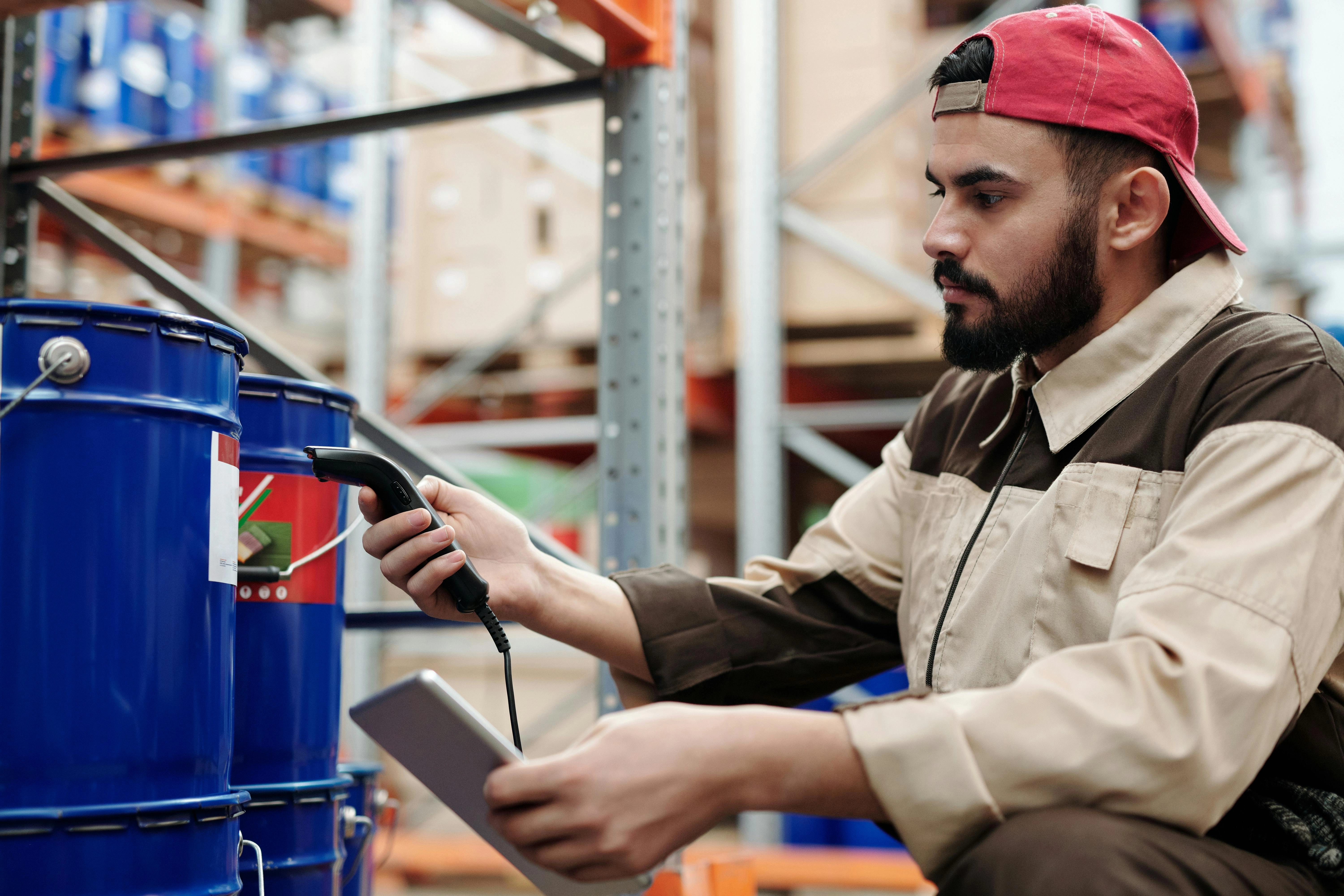 Warehouse Worker Scanning Inventory