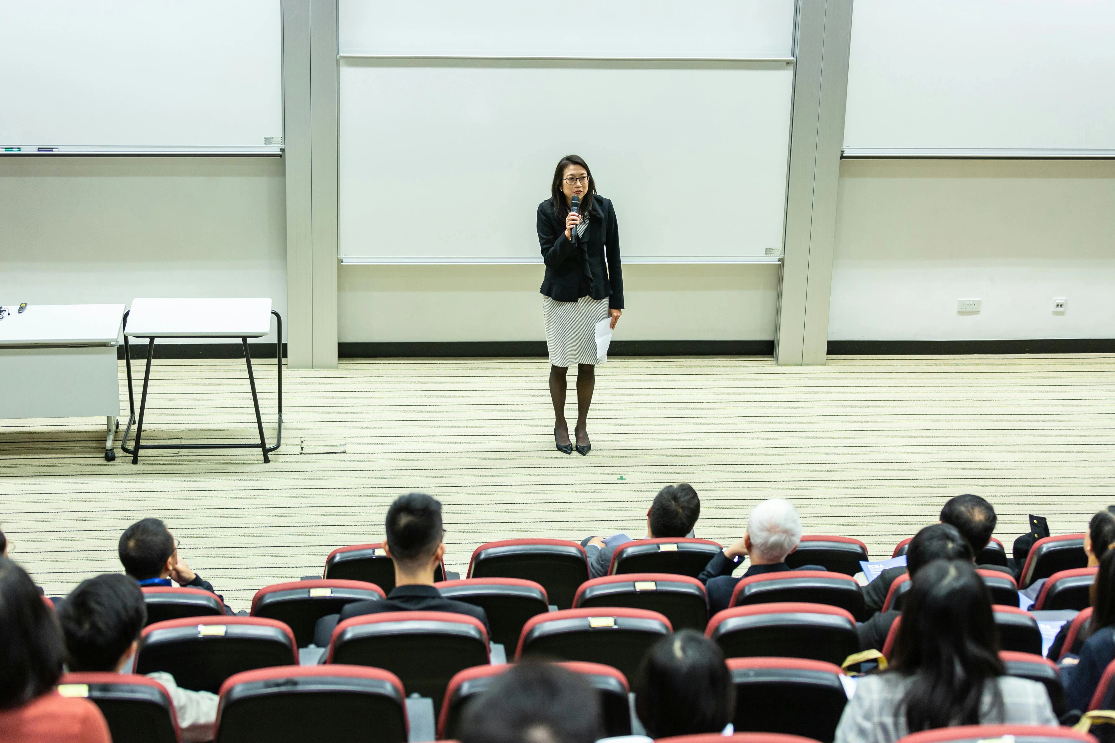 Business presentation in auditorium