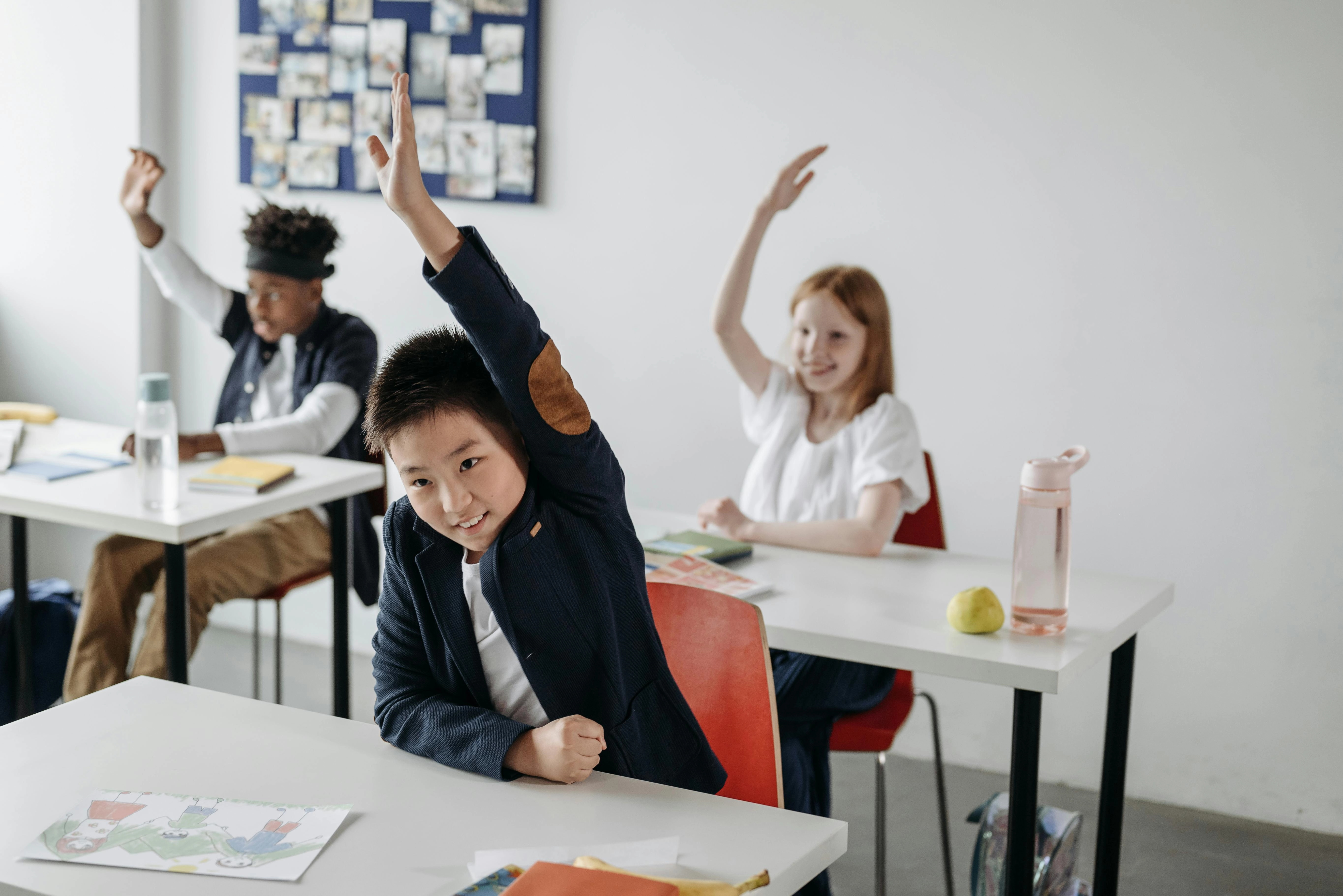 Engaged Students Raising Hands Engaged Students Raising Hands