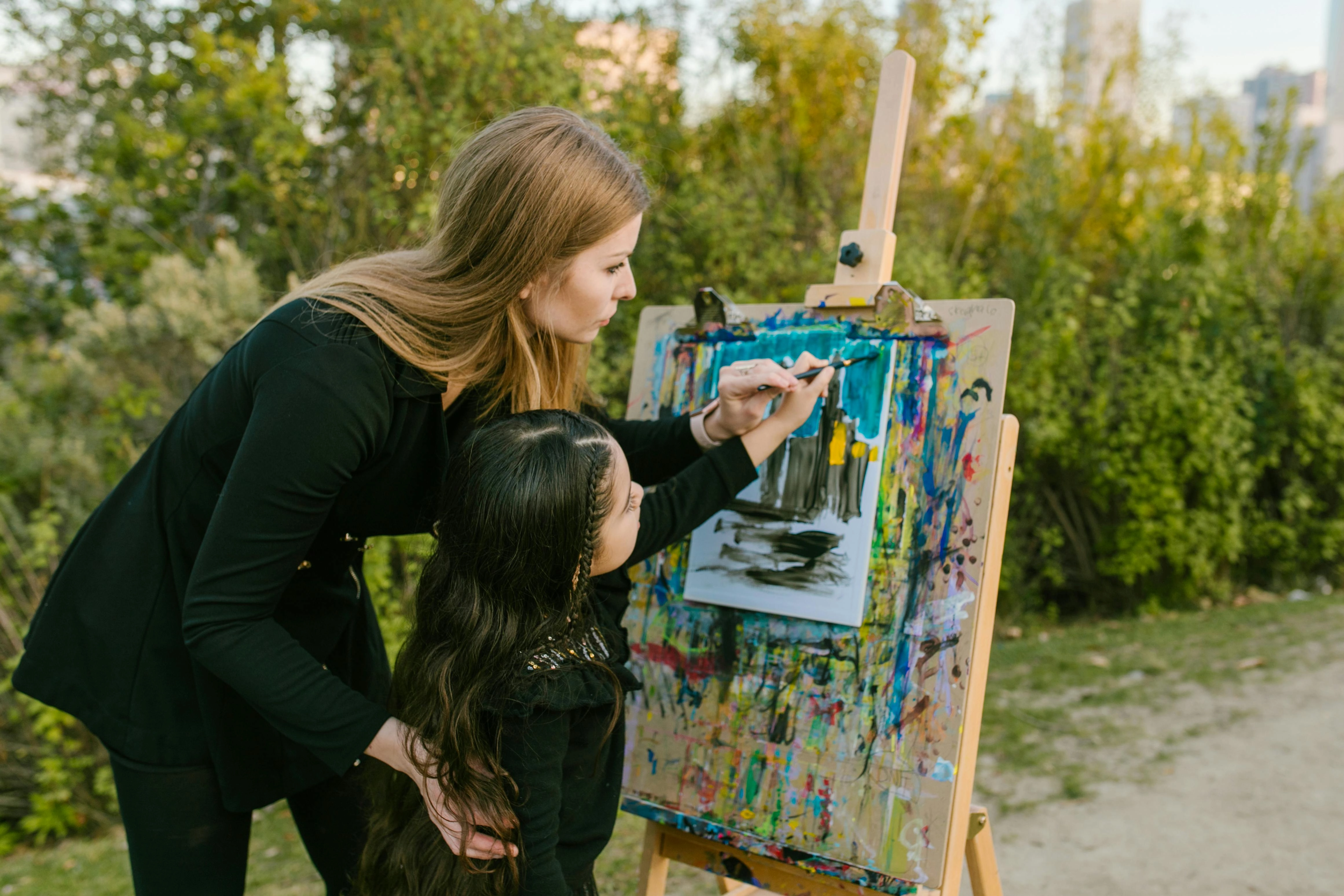 Mother-daughter outdoor painting lesson