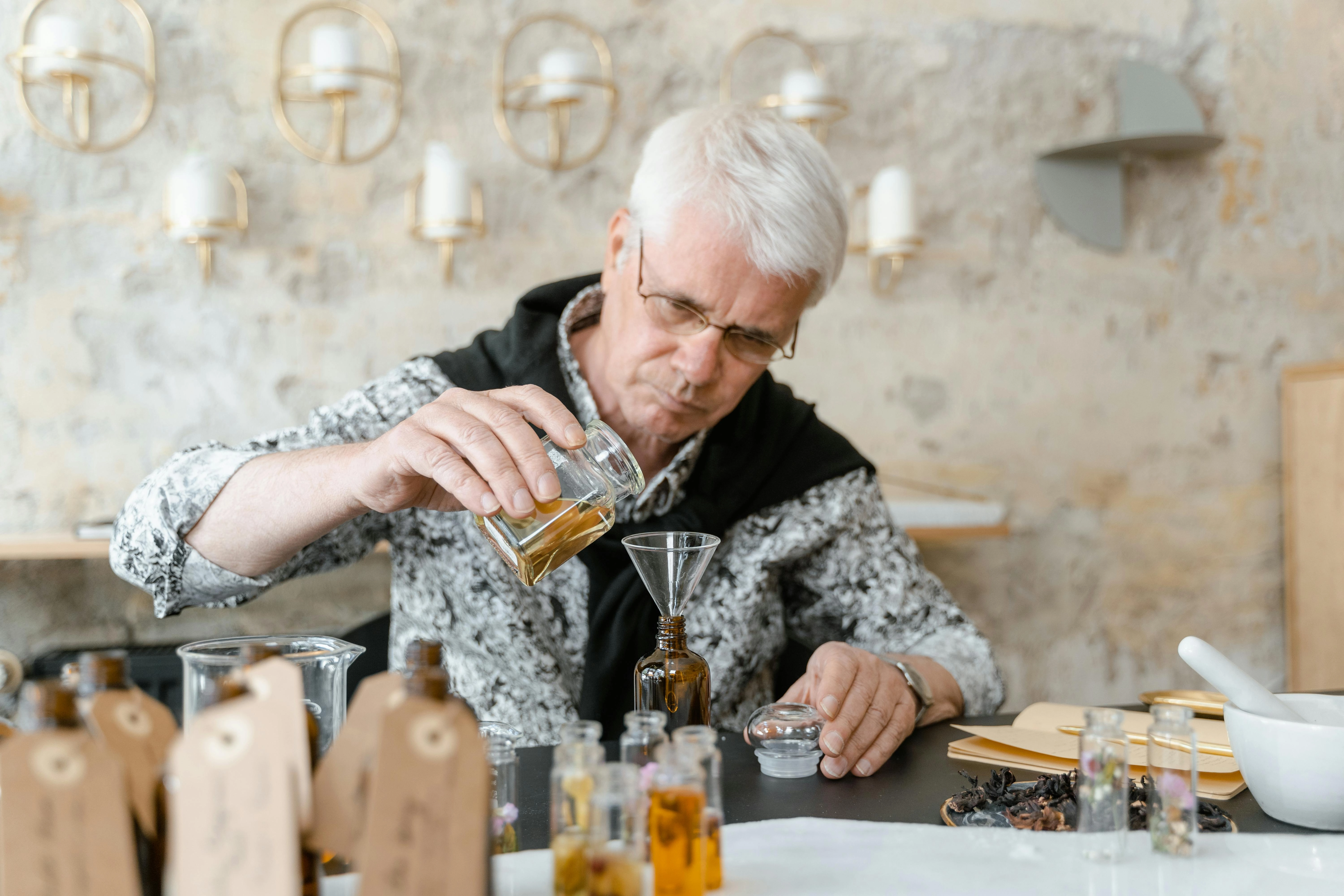 Perfumer Mixing Essential Oils Perfumer Mixing Essential Oils