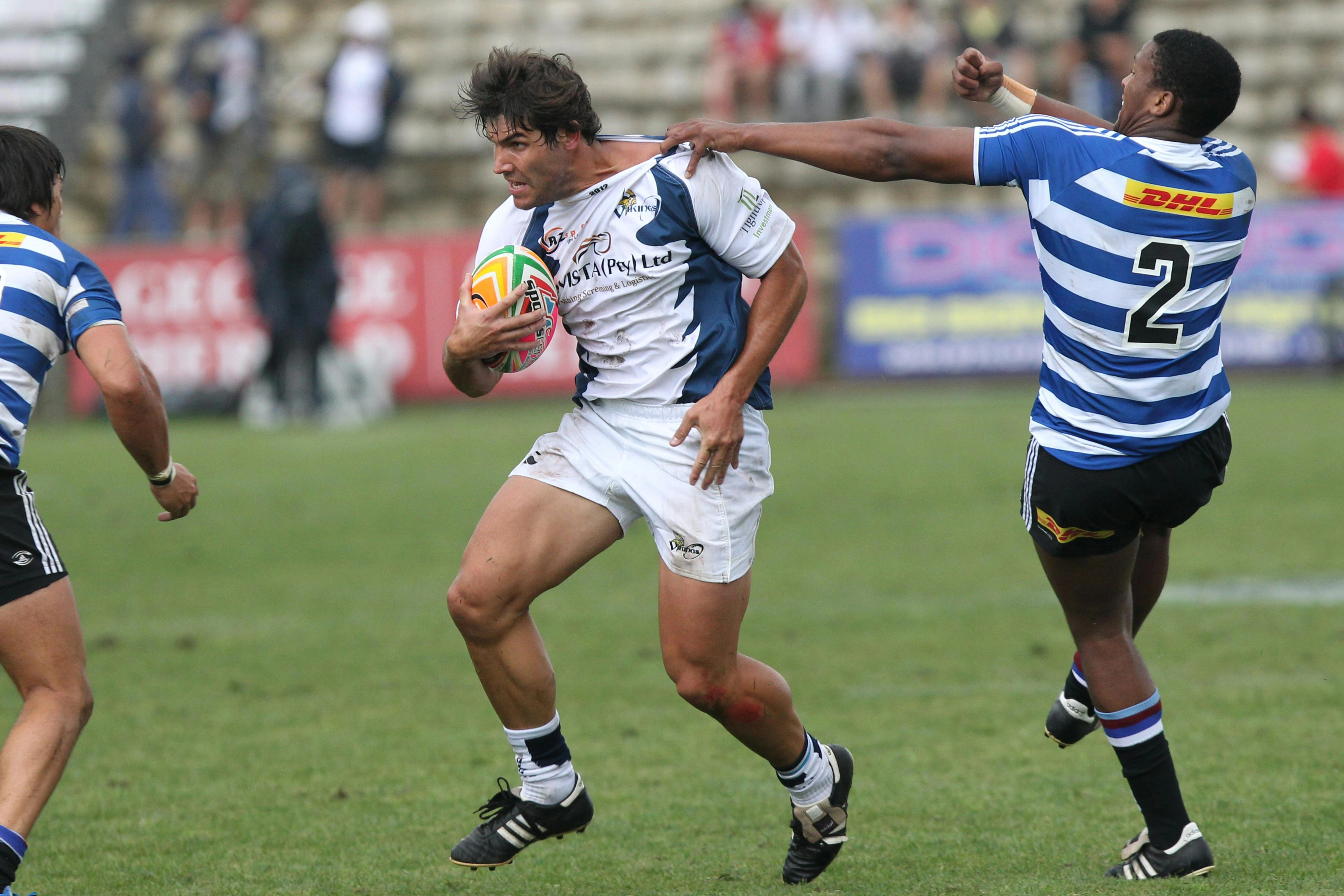 Rugby players in action Rugby players in action