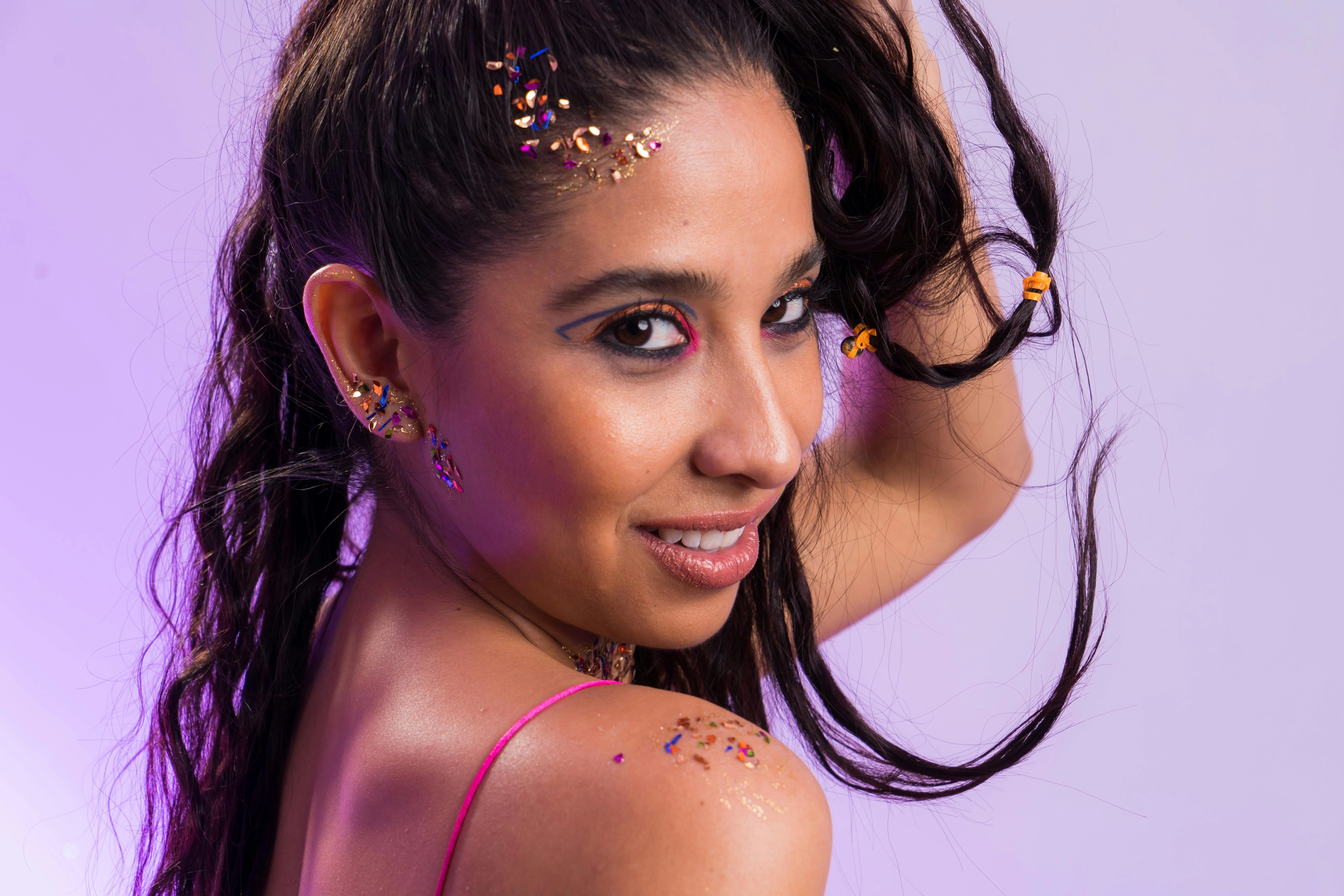 Vibrant Glittery Festival Makeup