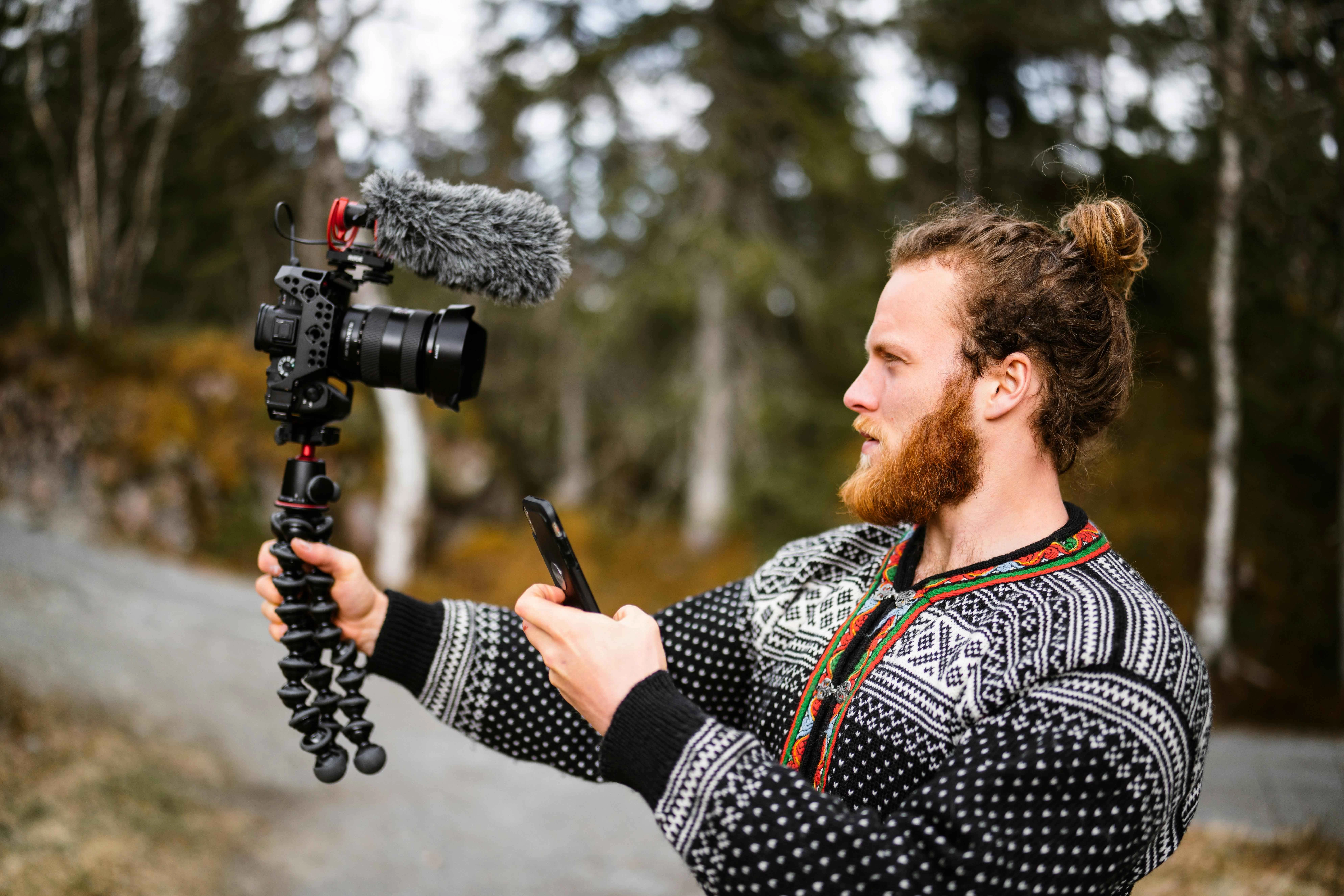 Vlogger filming in nature Vlogger filming in nature