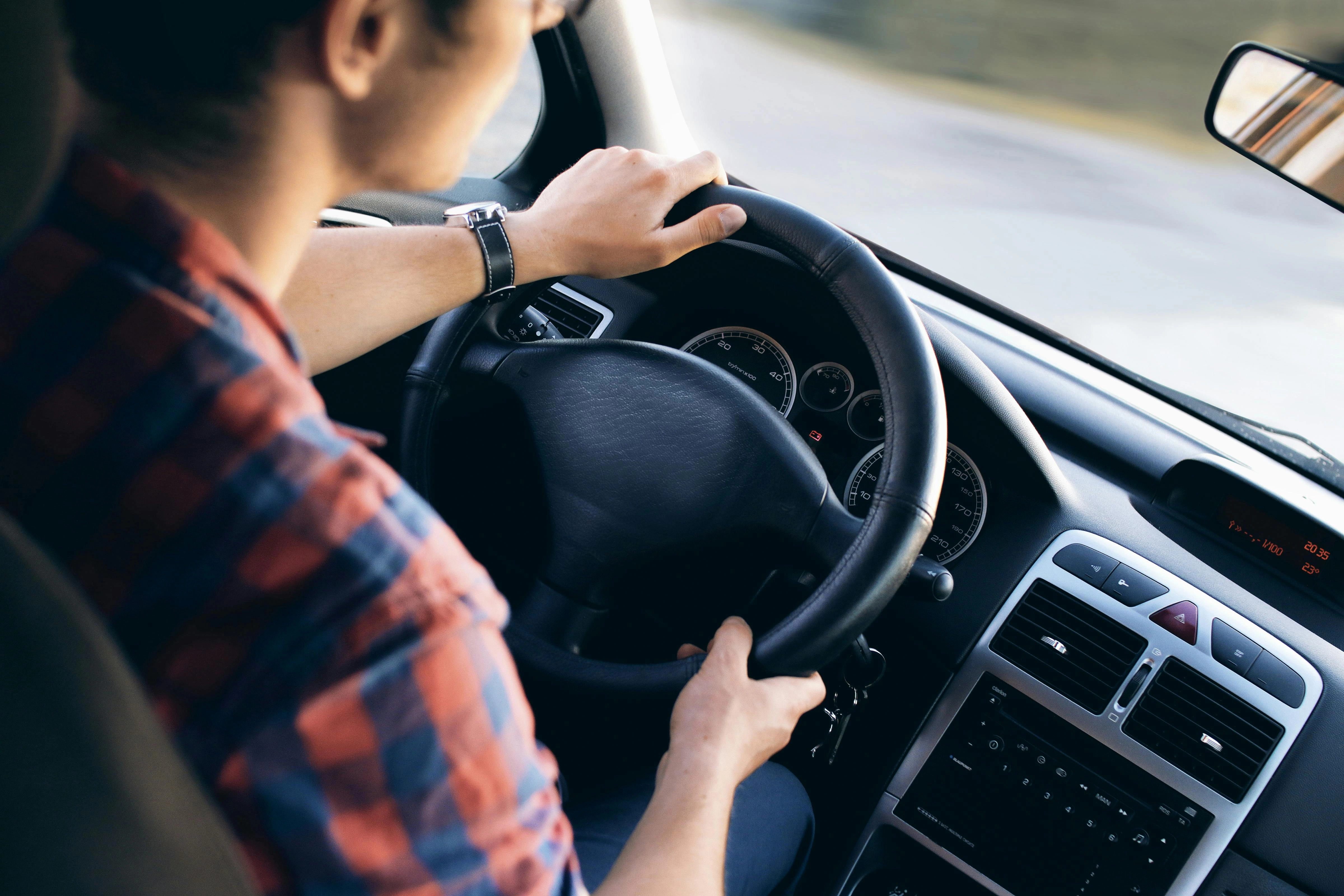 Driving with Plaid Shirt Driving with Plaid Shirt