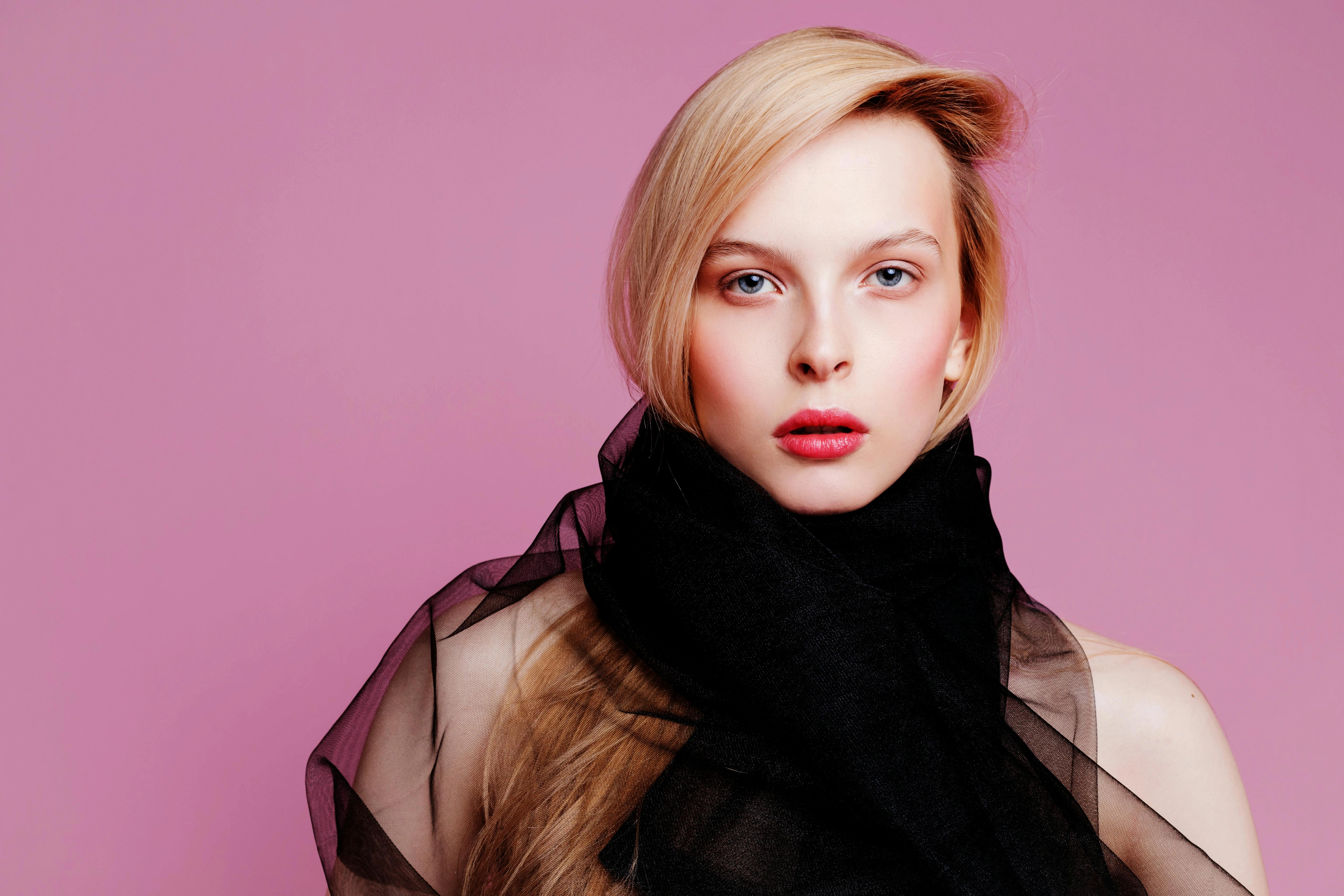 Elegant Portrait on Pink Background