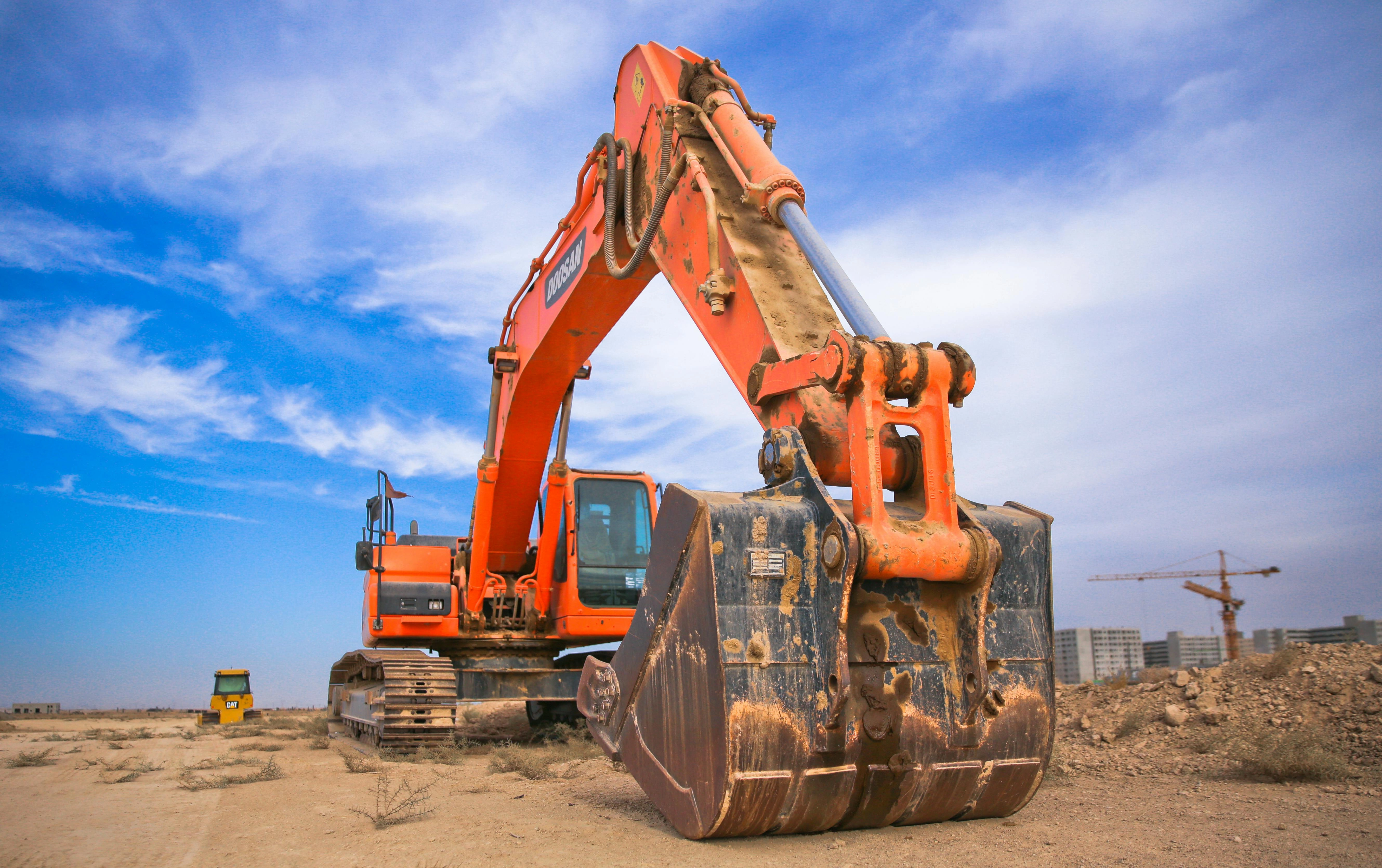 Orange Excavator on Construction Site
