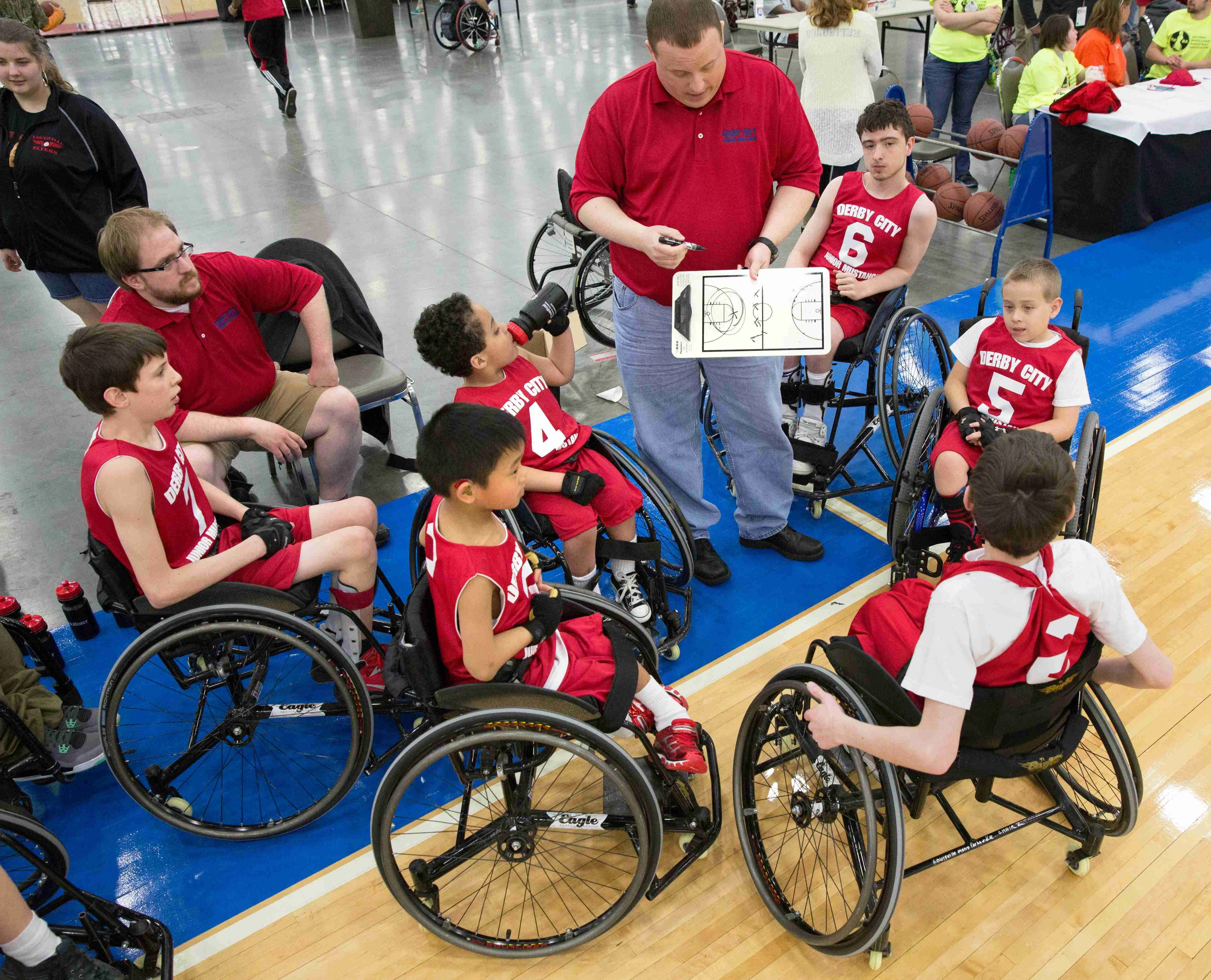 Wheelchair basketball team huddle Wheelchair basketball team huddle