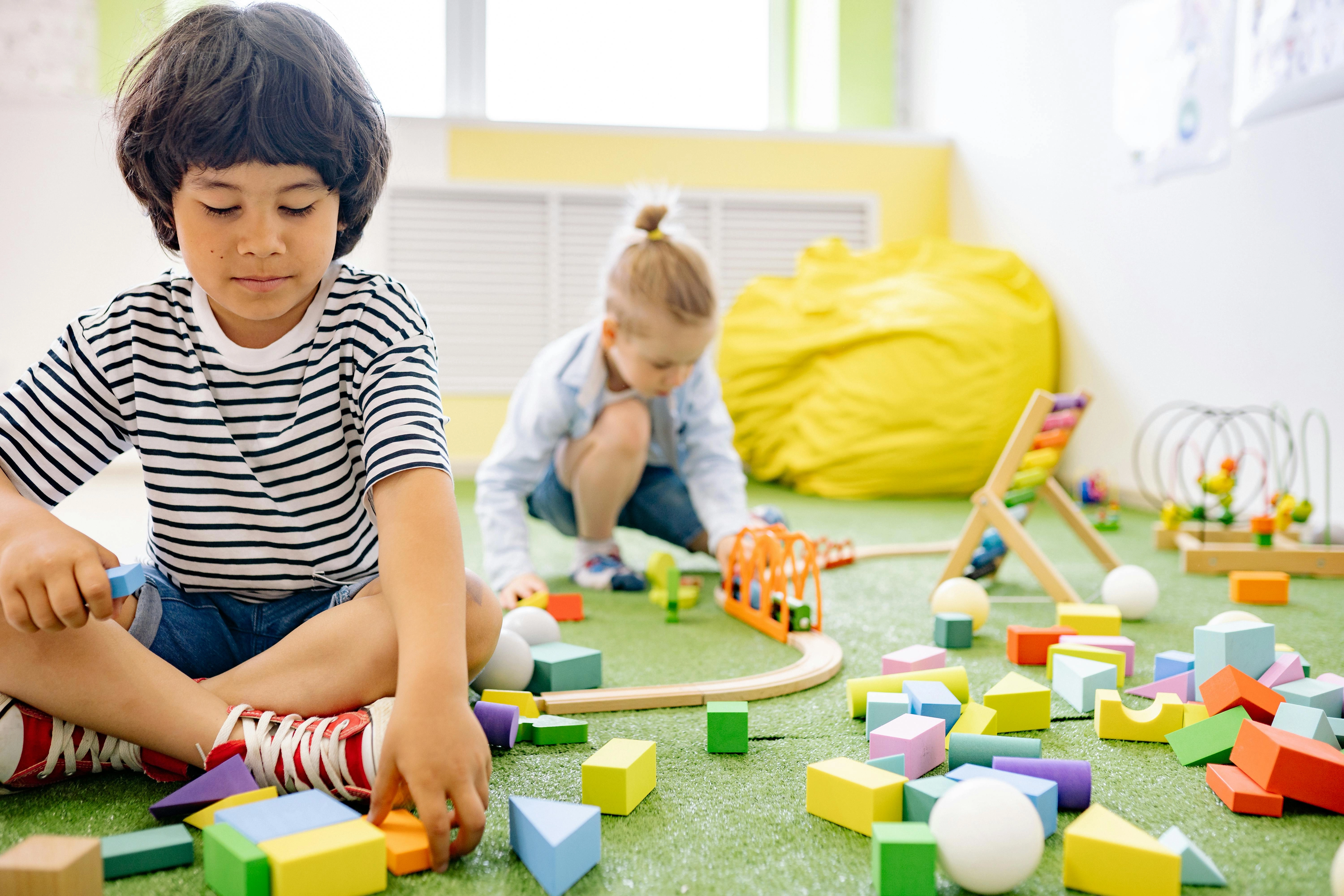 Children Playing with Colorful Toys Children Playing with Colorful Toys