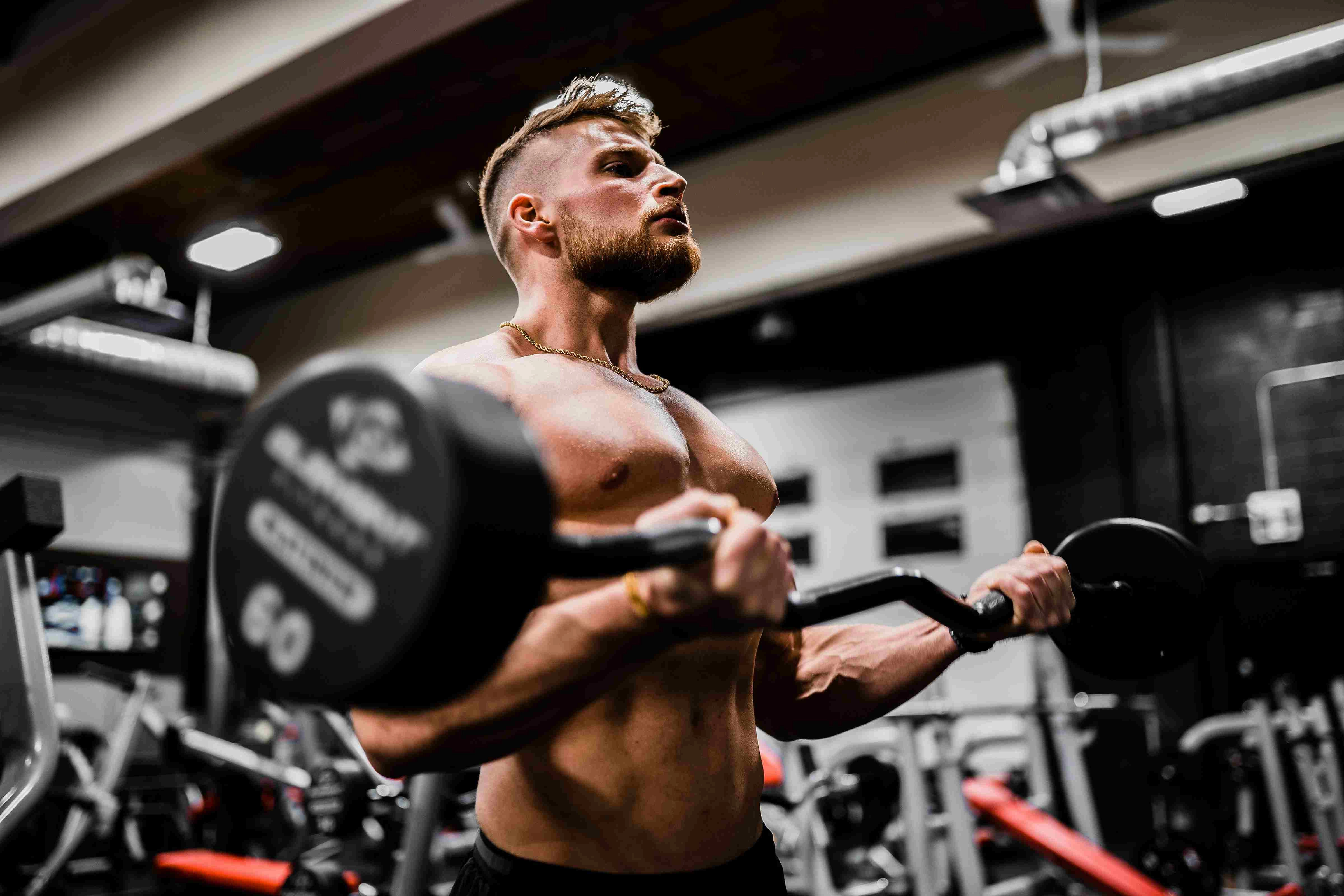 Muscular Man Lifting Weights Muscular Man Lifting Weights