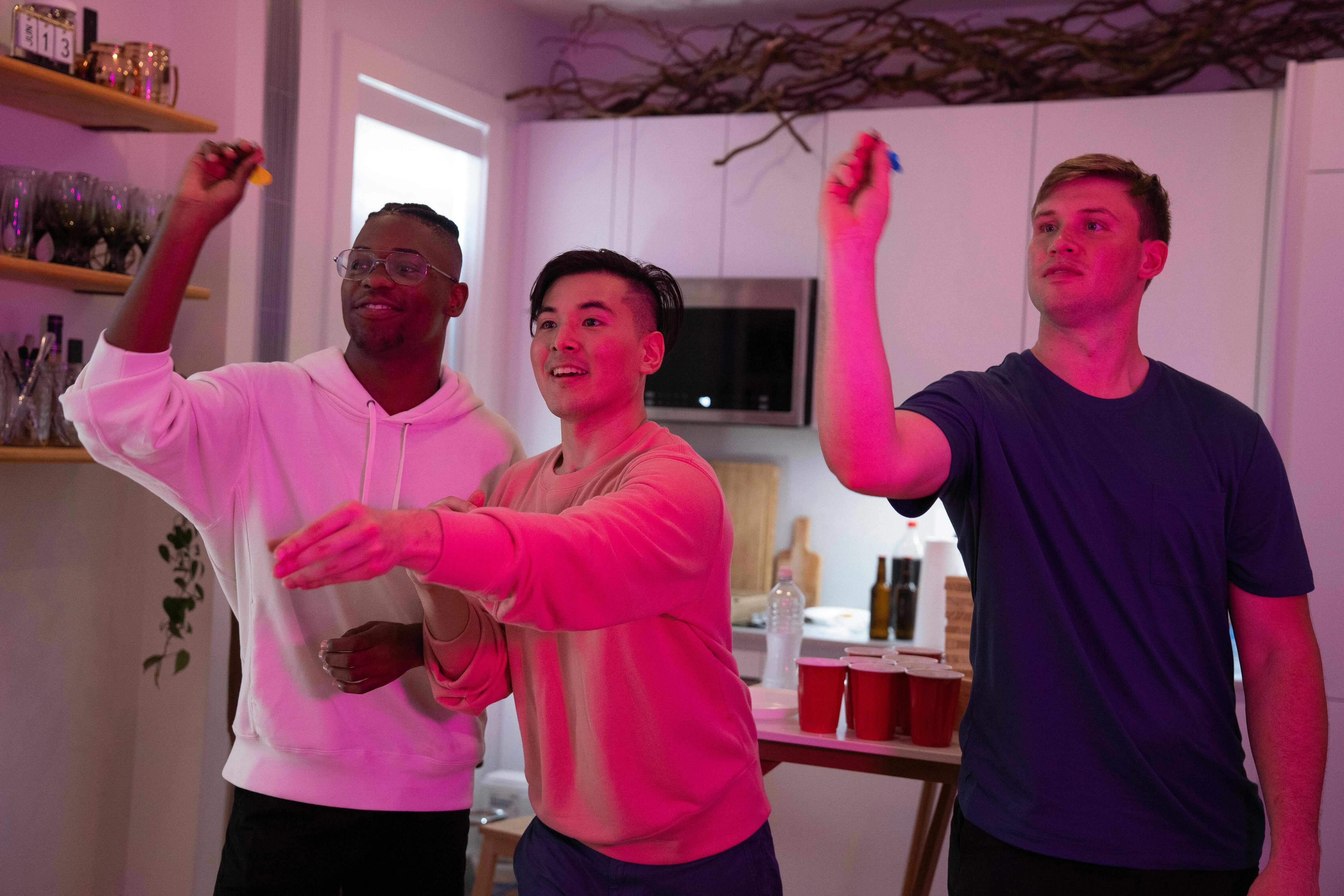 Diverse friends playing party game Diverse friends playing party game