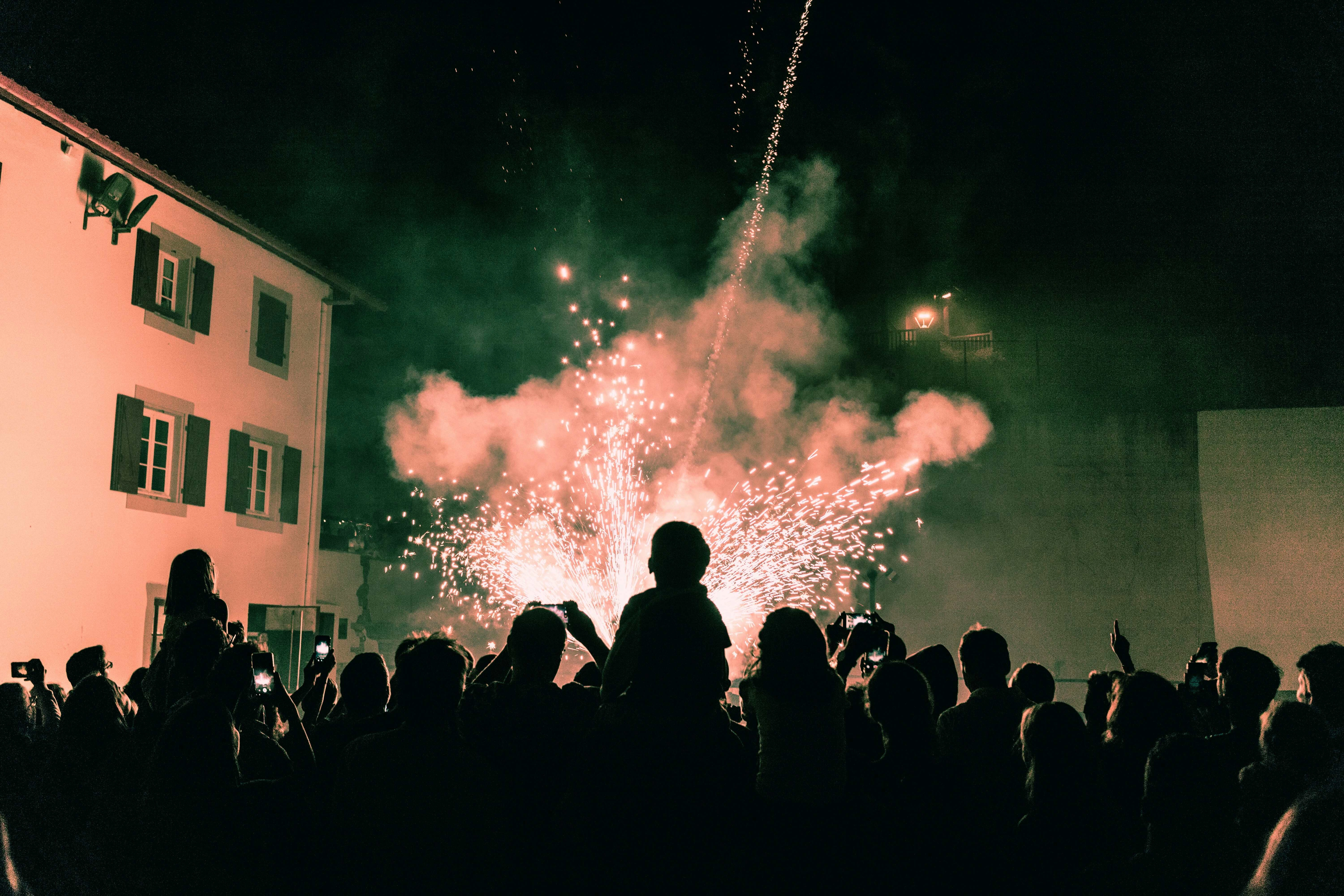 Fireworks Illuminate Festive Crowd