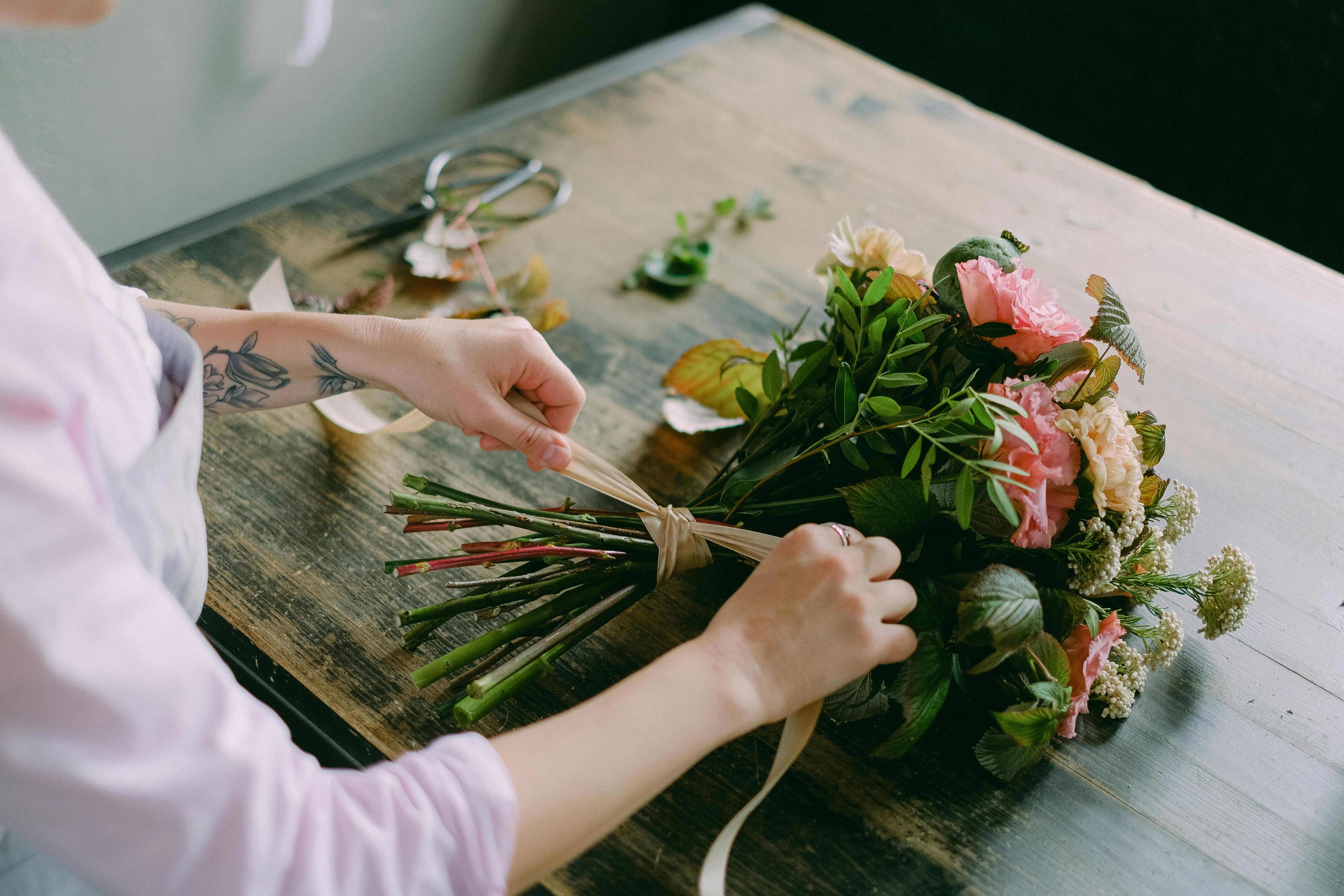 Florist Arranging Colorful Bouquet