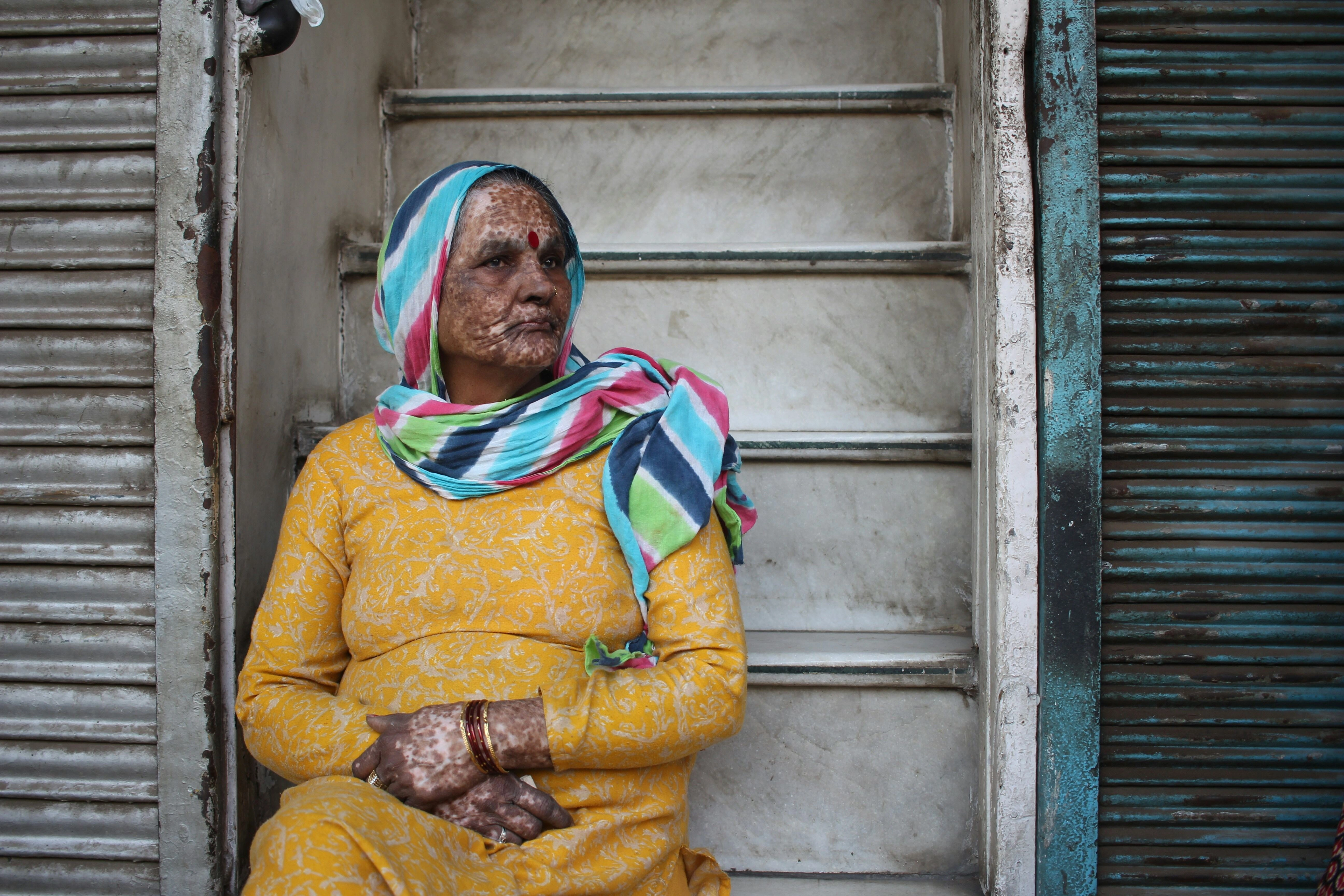 Resilient Woman in Colorful Attire Resilient Woman in Colorful Attire