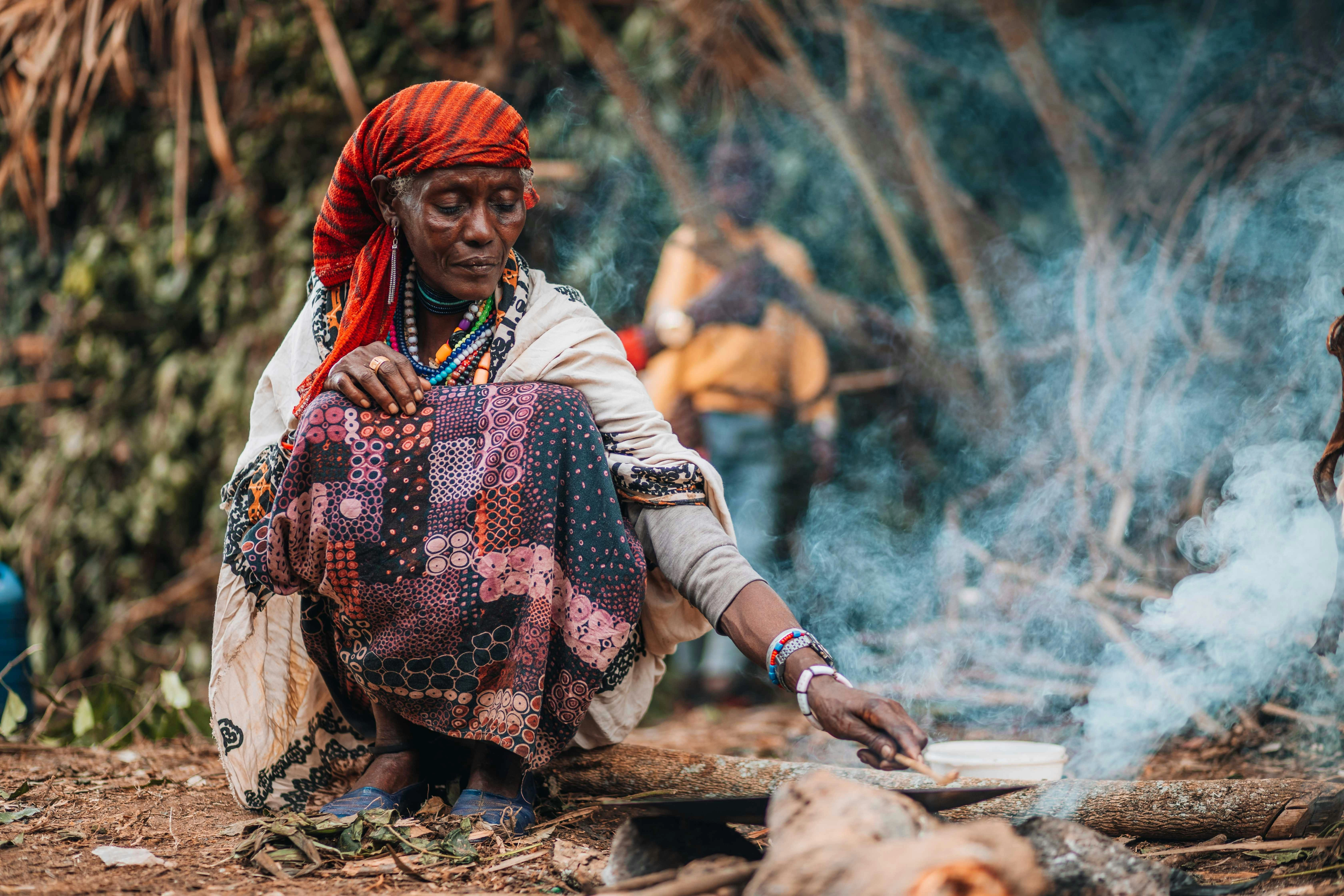African Woman Cooking Outdoors
