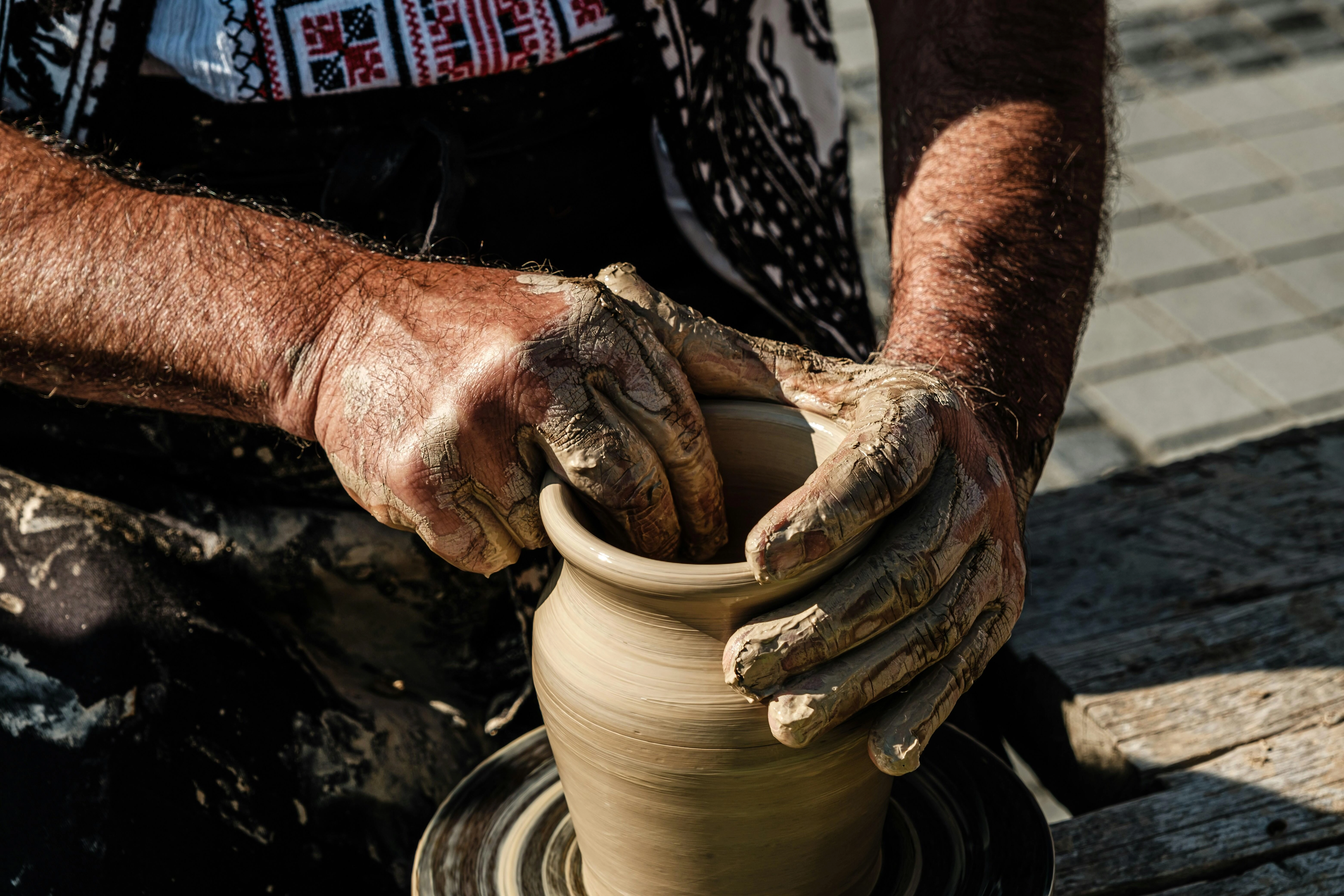 Artisan's Hands Shaping Clay