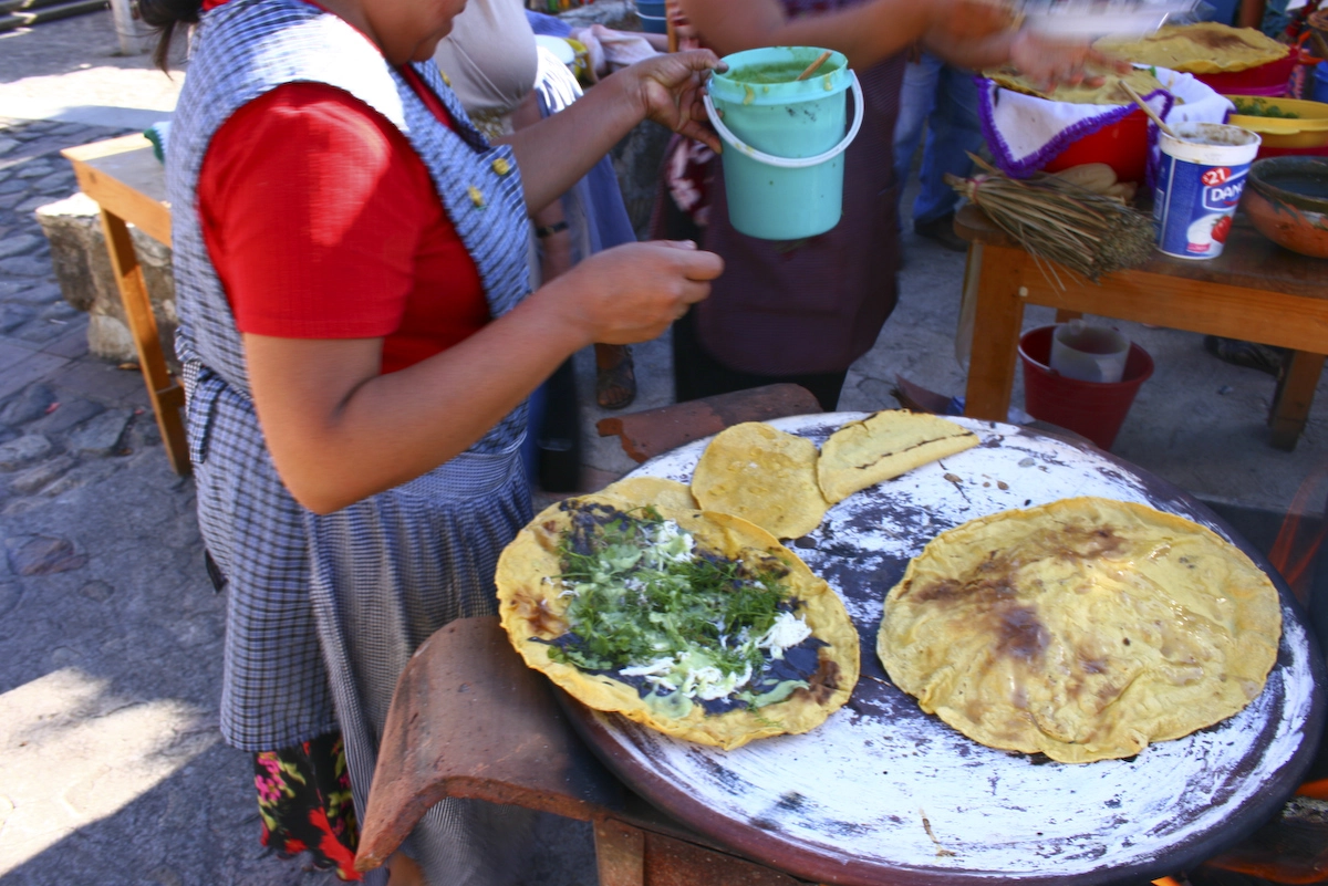 Street Vendor Making Tacos