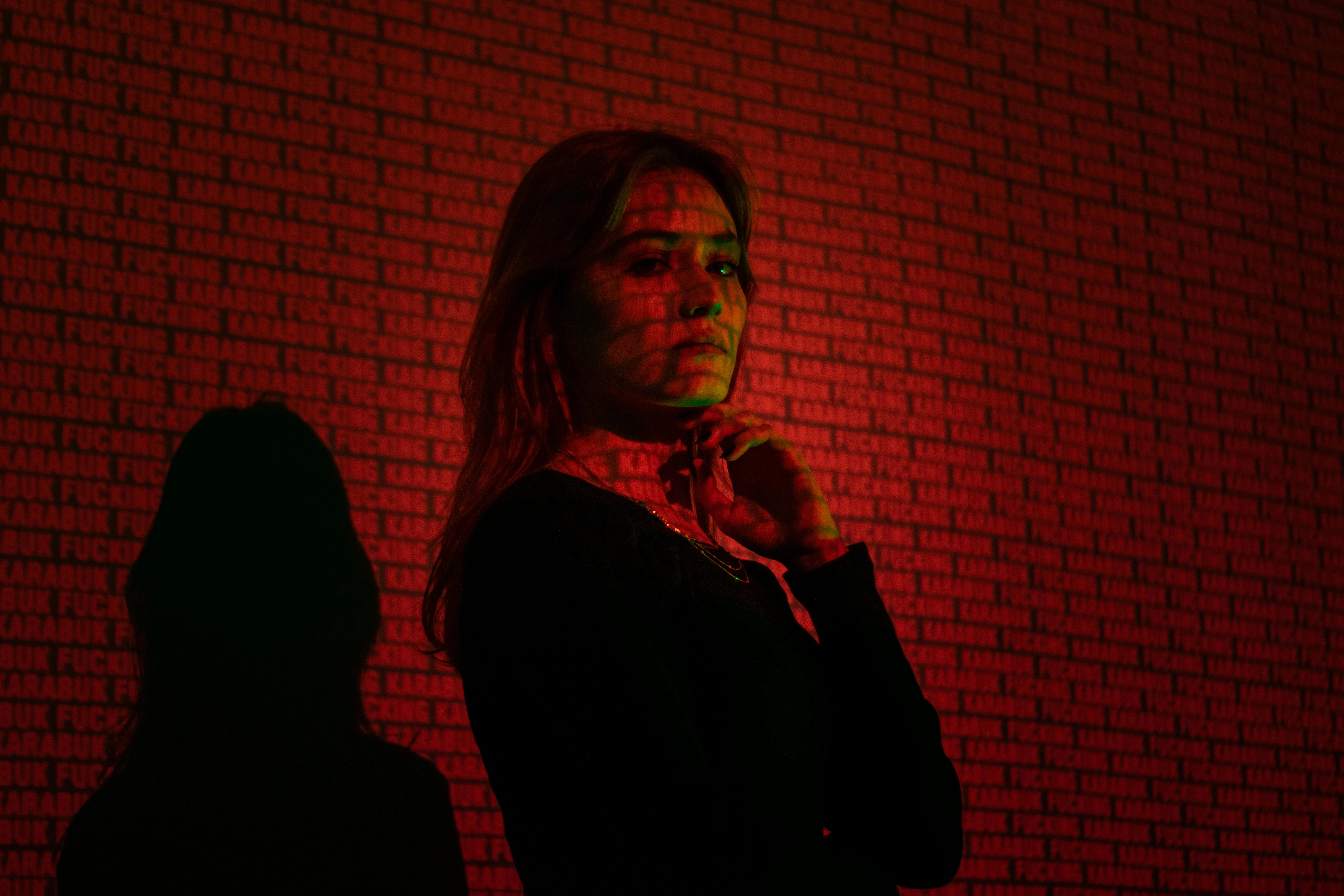 Moody red-lit portrait Shadow