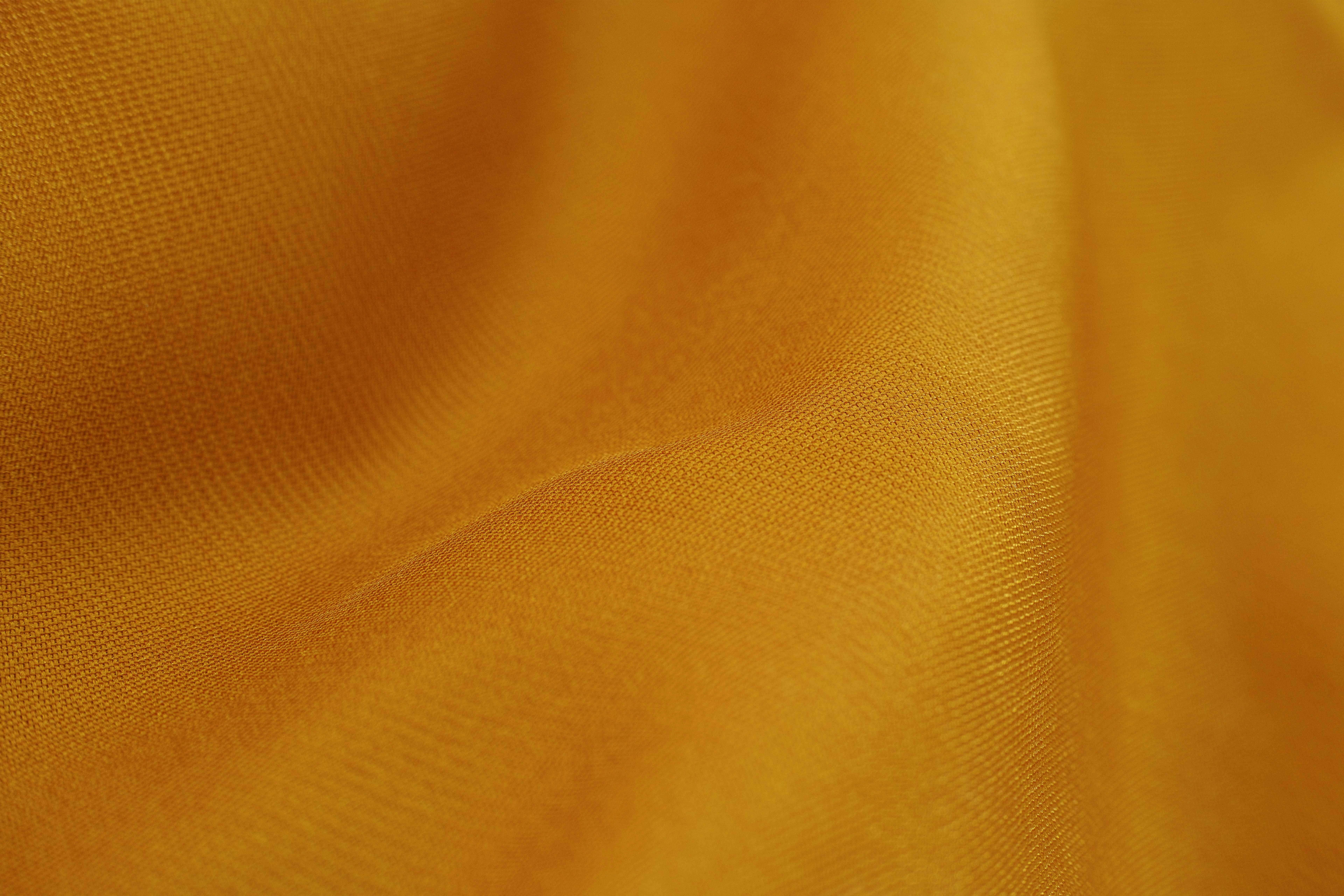 Golden Fabric Texture Close-up Golden Fabric Texture Close-up