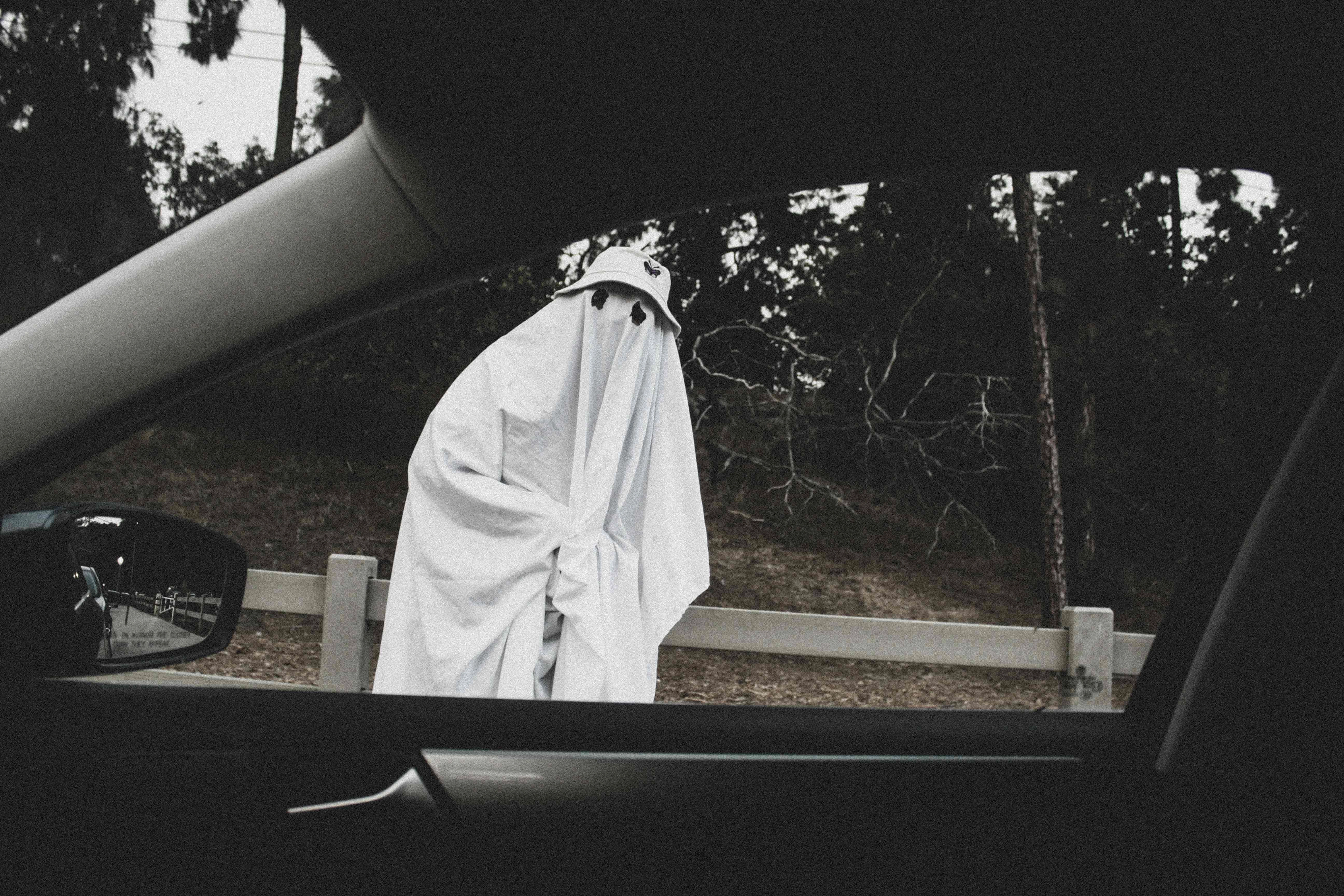 Ghostly Figure in Car Mirror Ghostly Figure in Car Mirror
