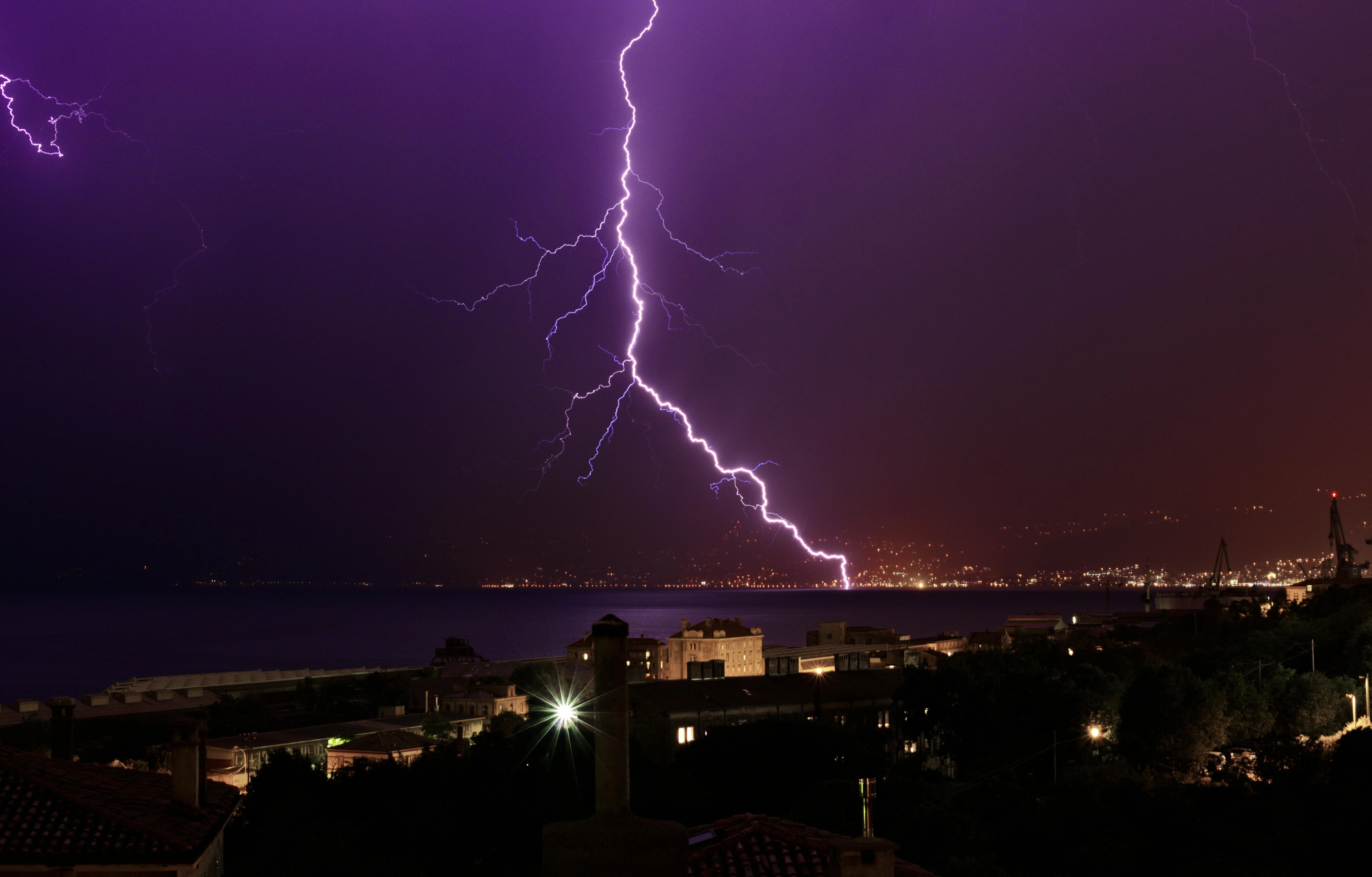 Lightning Strike Over Coastal City