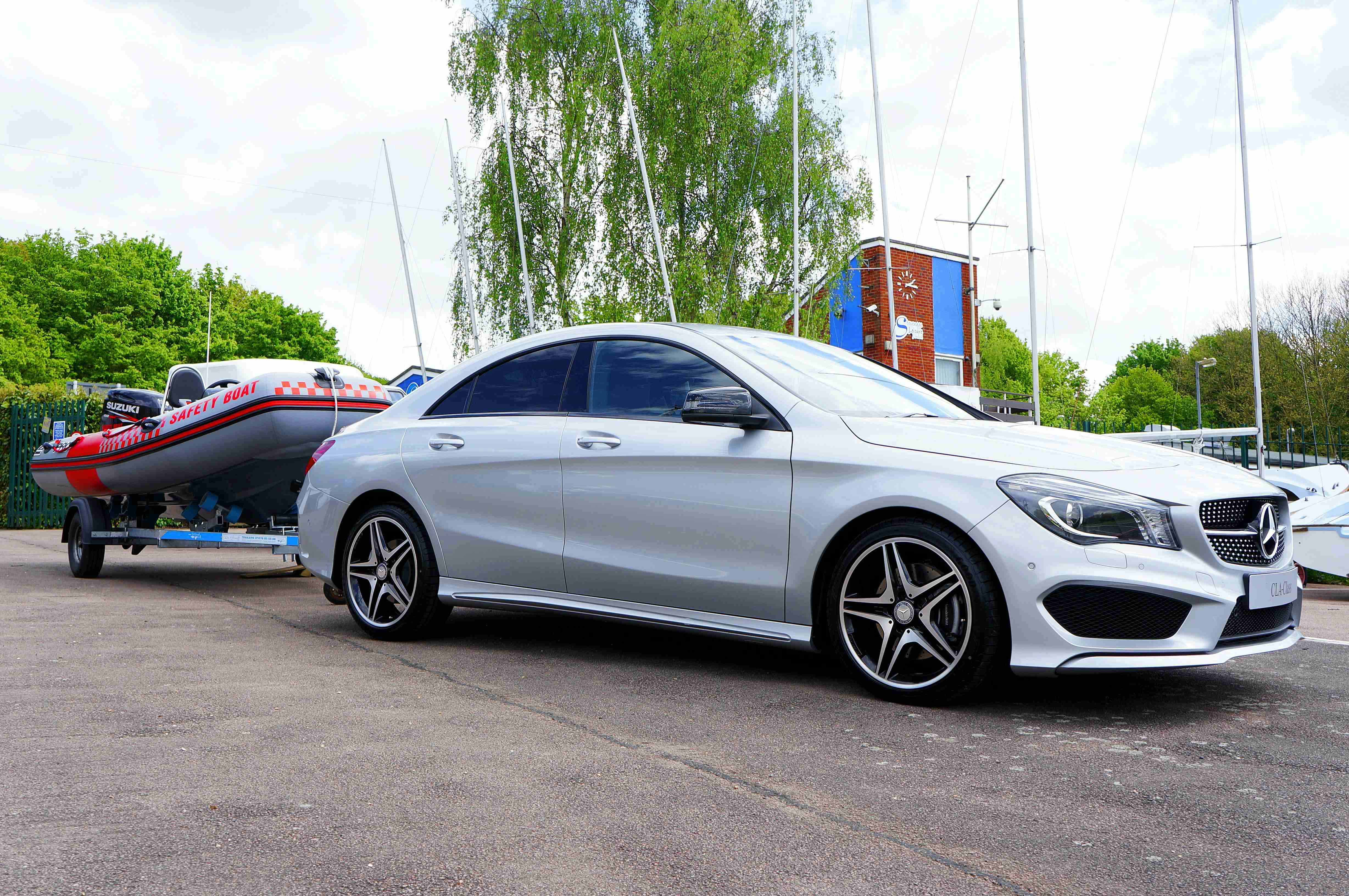 Luxury Car Towing Boat