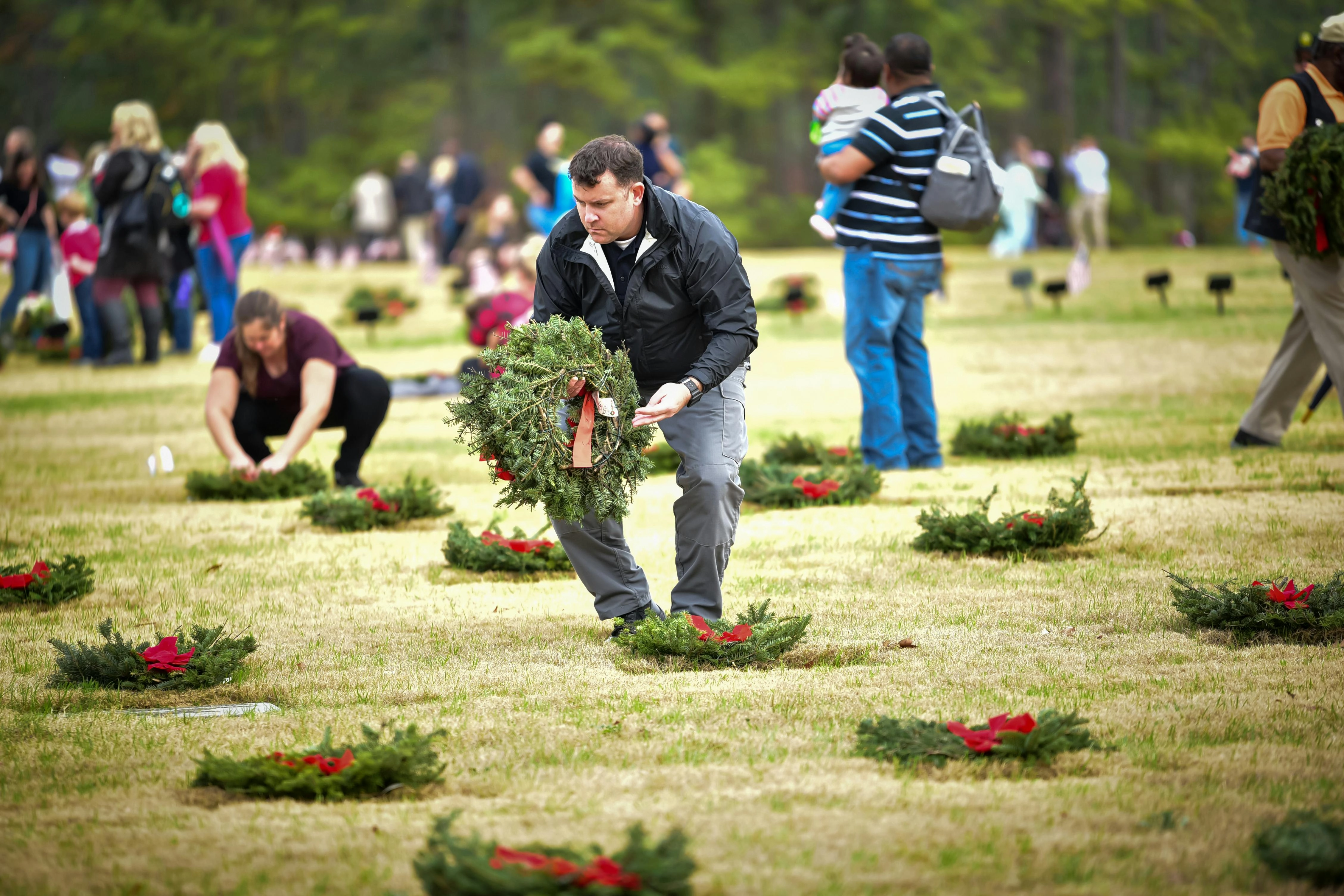 Wreath-laying ceremony at cemetery