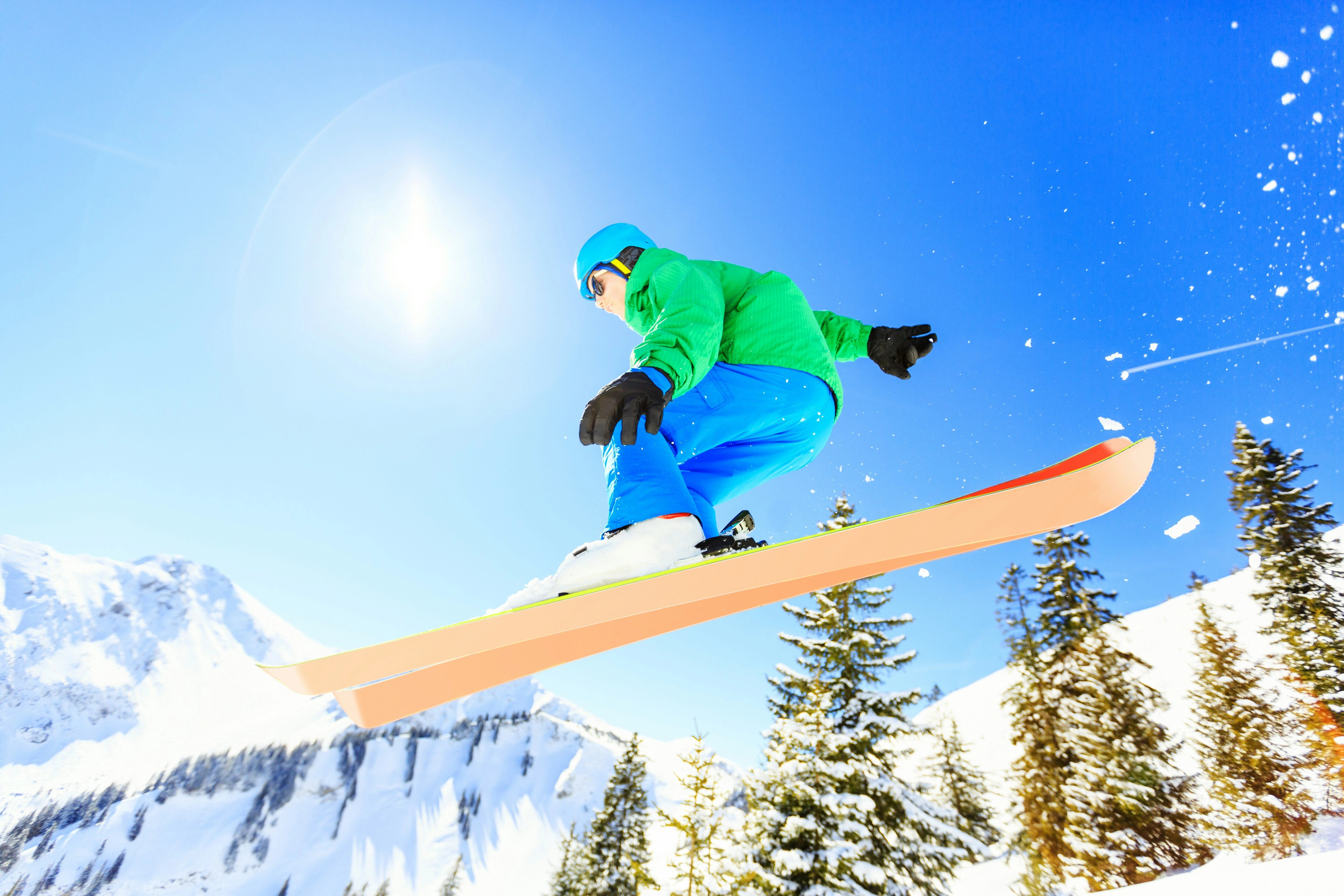 Airborne Skier in Sunlight Airborne Skier in Sunlight