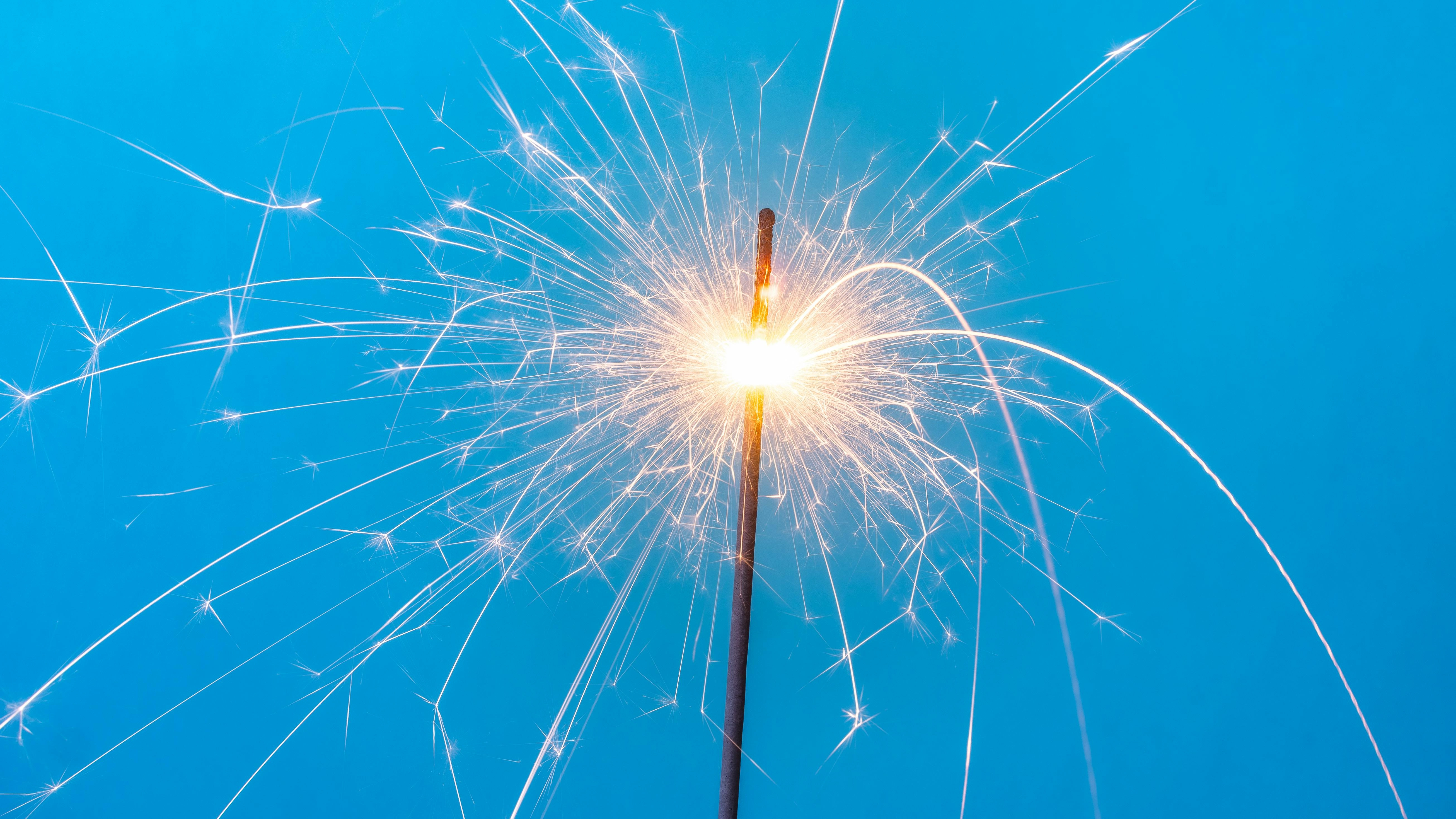 Sparkling Sparkler Against Sky Sparkling Sparkler Against Sky