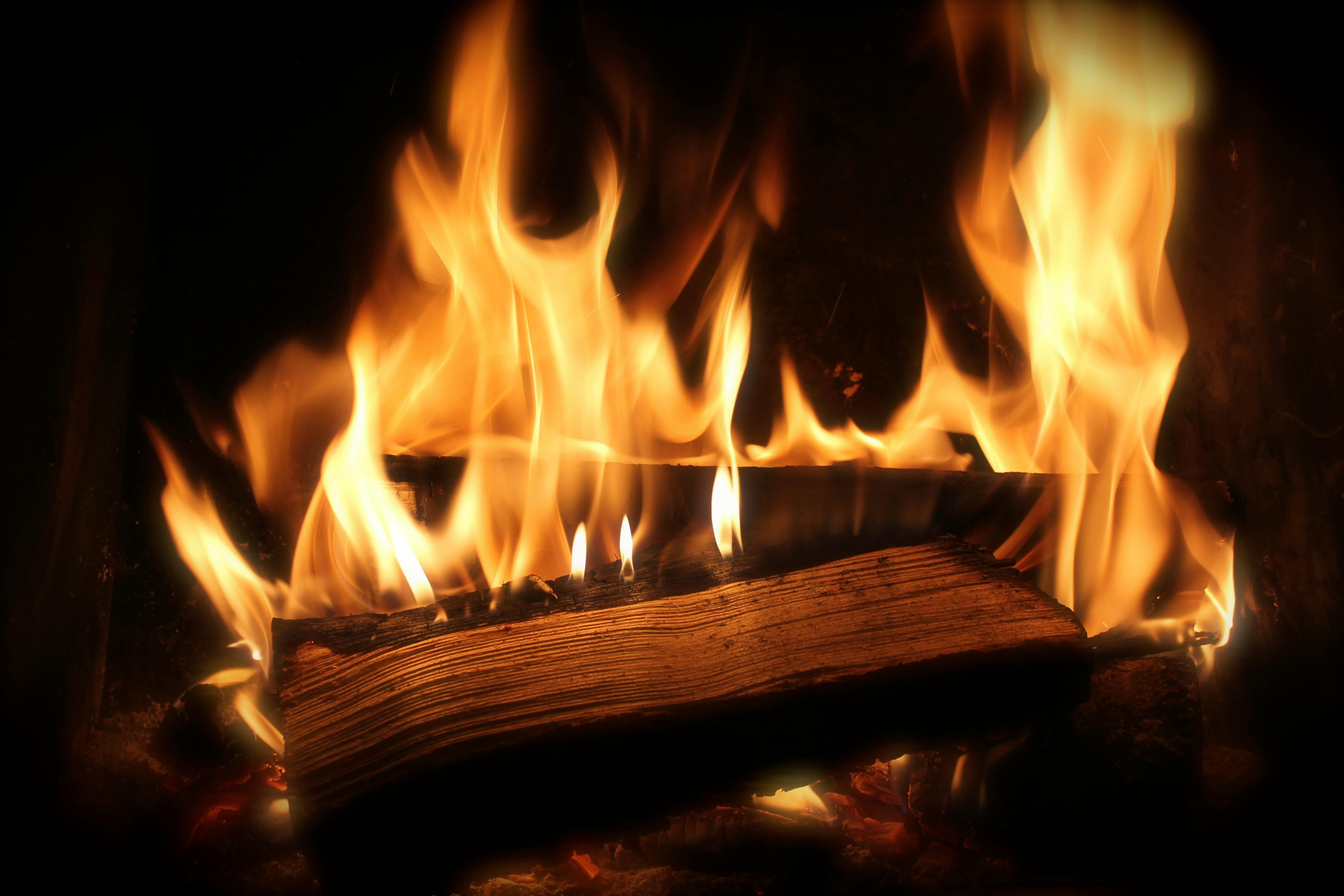 Roaring Fireplace with Log