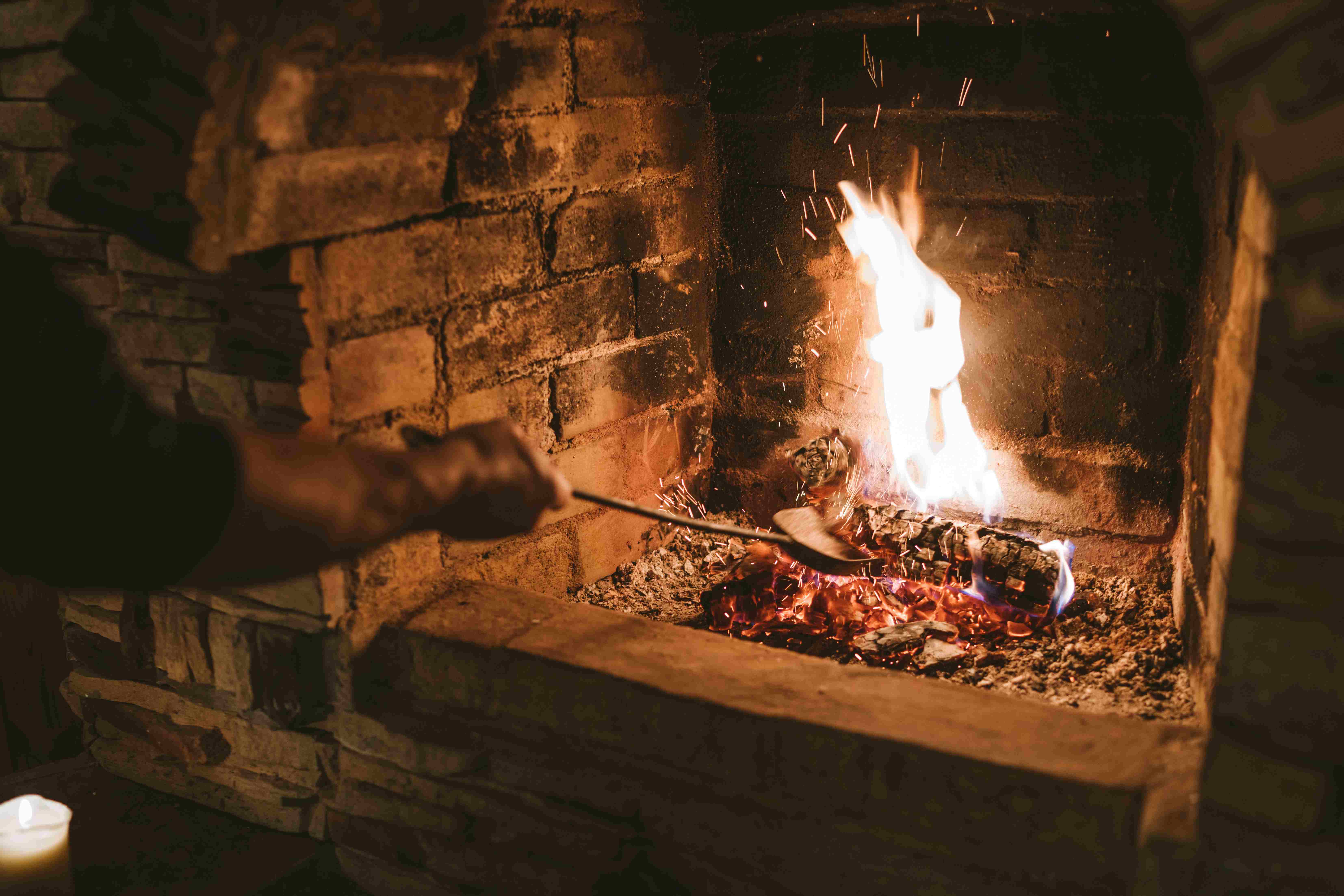 Cozy Fireplace Tending Scene