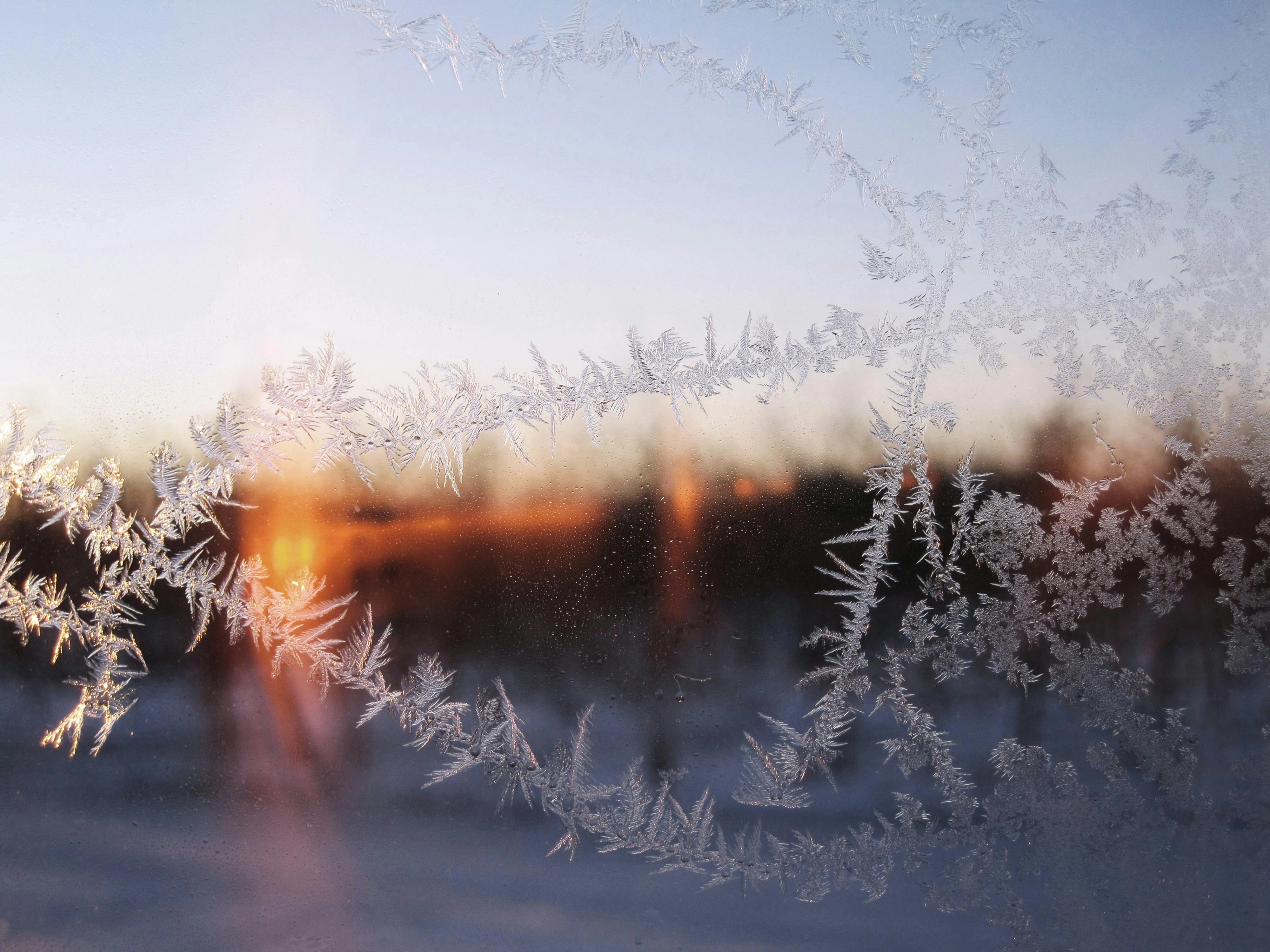 Frosty Window Winter Sunrise