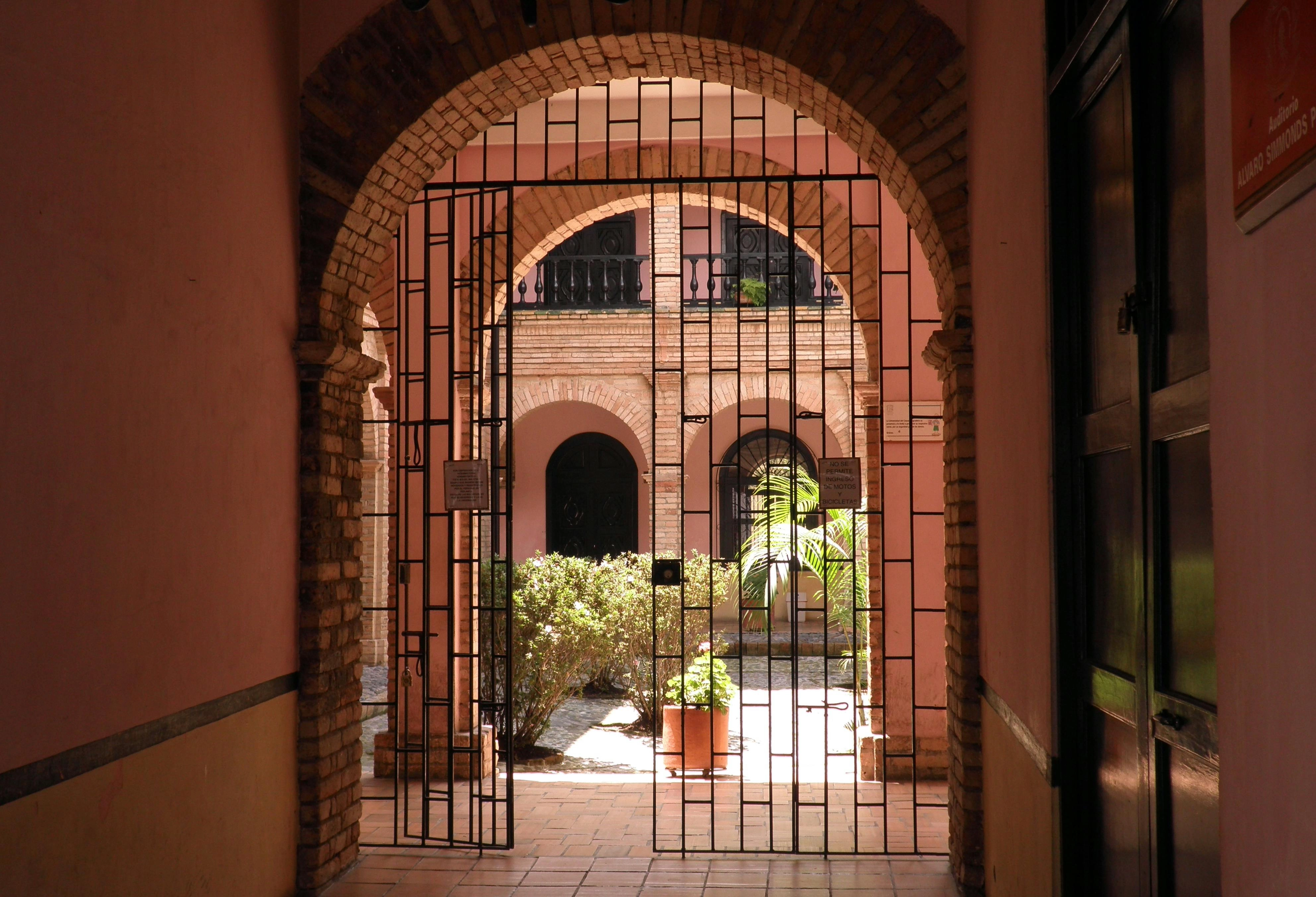Arched Courtyard with Iron Gate