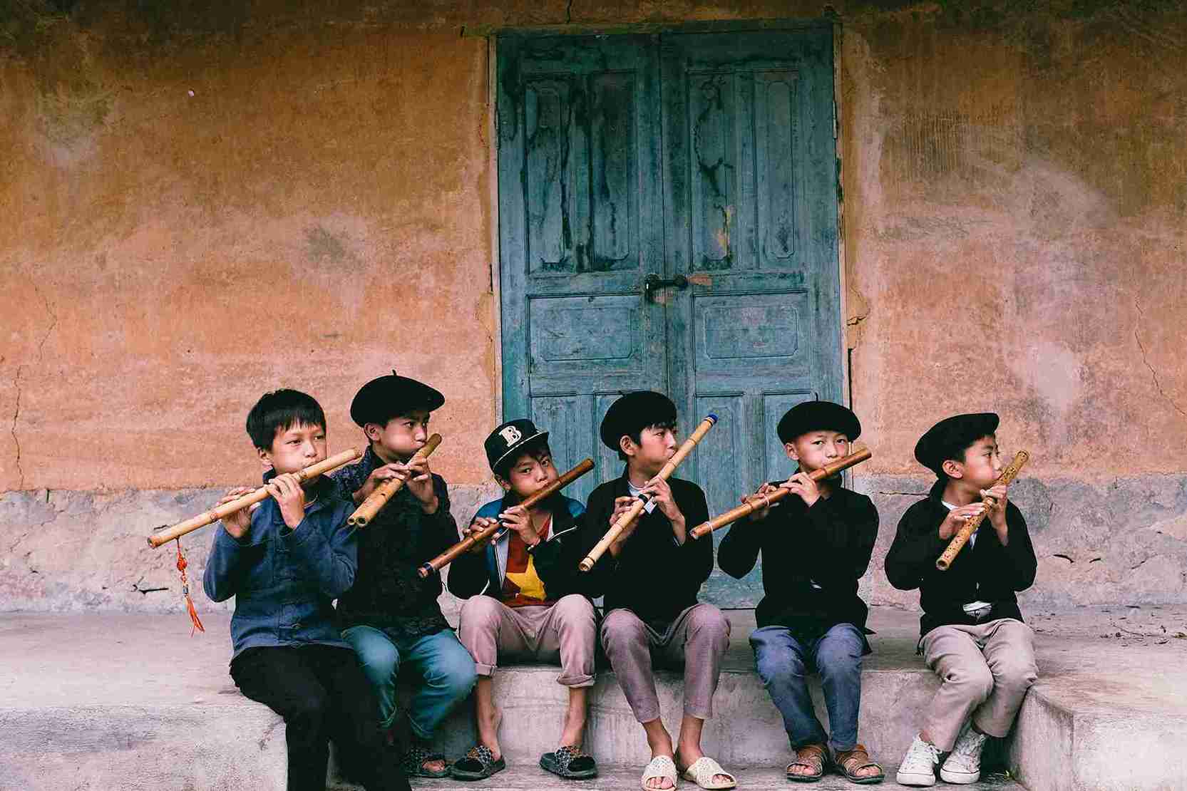 Young Flutists in Traditional Attire